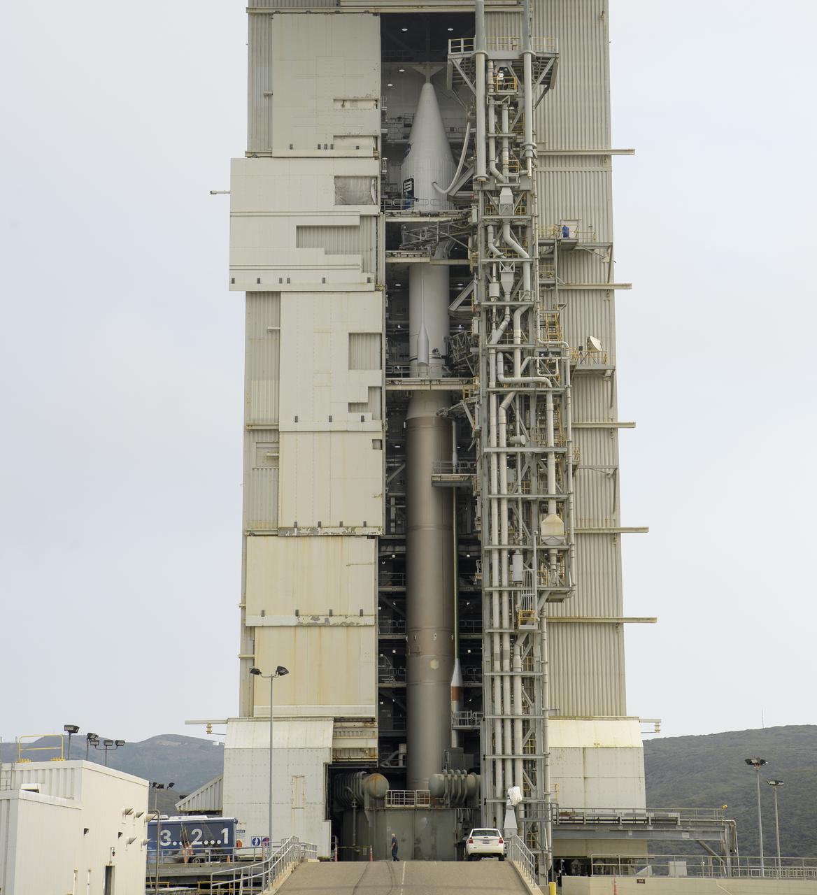 The United Launch Alliance (ULA) Atlas V rocket with the Landsat 9 satellite onboard is seen, Saturday, Sept. 25, 2021, at Vandenberg Space Force Base in California. The Landsat 9 satellite, a joint NASA/U.S. Geological Survey mission that will continue the legacy of monitoring Earth’s land and coastal regions, is scheduled for liftoff Monday, Sept. 27. Photo Credit: (NASA/Bill Ingalls)