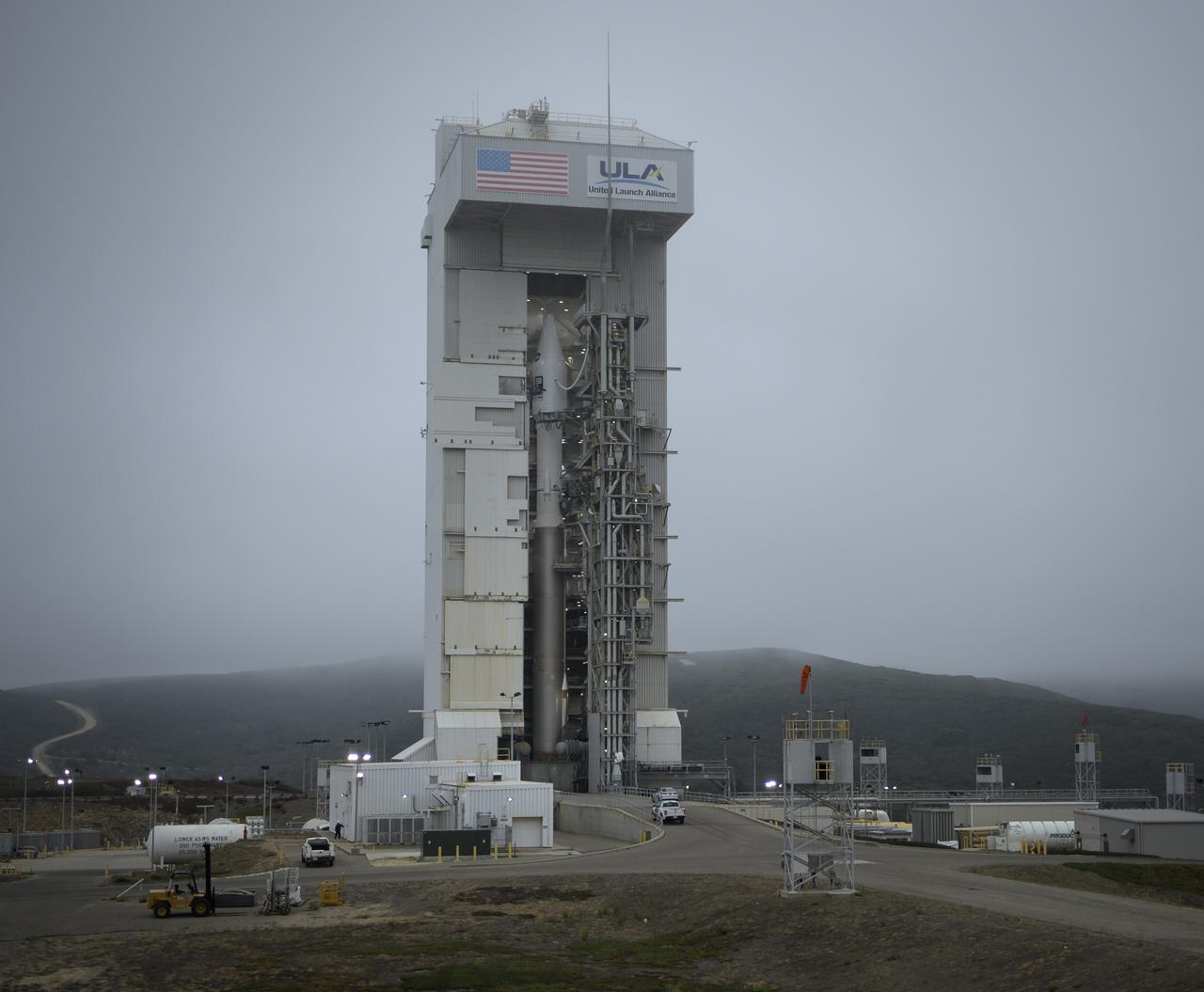 The United Launch Alliance (ULA) Atlas V rocket with the Landsat 9 satellite onboard is seen, Saturday, Sept. 25, 2021, at Vandenberg Space Force Base in California. The Landsat 9 satellite, a joint NASA/U.S. Geological Survey mission that will continue the legacy of monitoring Earth’s land and coastal regions, is scheduled for liftoff Monday, Sept. 27. Photo Credit: (NASA/Bill Ingalls)