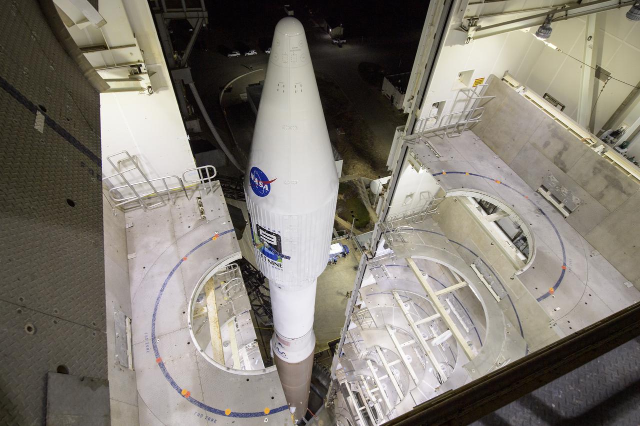 The United Launch Alliance (ULA) Atlas V rocket with the Landsat 9 satellite onboard is seen, Monday, Sept. 27, 2021, as the mobile launcher platform (MLP) is rolled back at Vandenberg Space Force Base in California. The Landsat 9 satellite is a joint NASA/U.S. Geological Survey mission that will continue the legacy of monitoring Earth’s land and coastal regions. Photo Credit: (NASA/Bill Ingalls)