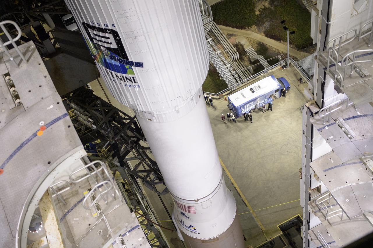 The United Launch Alliance (ULA) Atlas V rocket with the Landsat 9 satellite onboard is seen, Monday, Sept. 27, 2021, as the mobile launcher platform (MLP) is rolled back at Vandenberg Space Force Base in California. The Landsat 9 satellite is a joint NASA/U.S. Geological Survey mission that will continue the legacy of monitoring Earth’s land and coastal regions. Photo Credit: (NASA/Bill Ingalls)