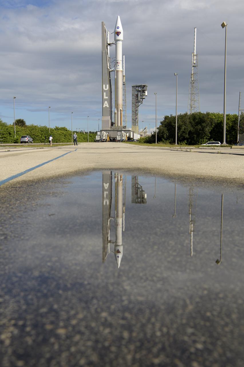 A United Launch Alliance Atlas V rocket with the Lucy spacecraft aboard is seen as it is rolled out of the Vertical Integration Facility to the launch pad at Space Launch Complex 41, Thursday, Oct. 14, 2021, at Cape Canaveral Space Force Station in Florida. Lucy will be the first spacecraft to study Jupiter's Trojan Asteroids. Like the mission's namesake – the fossilized human ancestor, "Lucy," whose skeleton provided unique insight into humanity's evolution – Lucy will revolutionize our knowledge of planetary origins and the formation of the solar system. Photo Credit: (NASA/Bill Ingalls)
