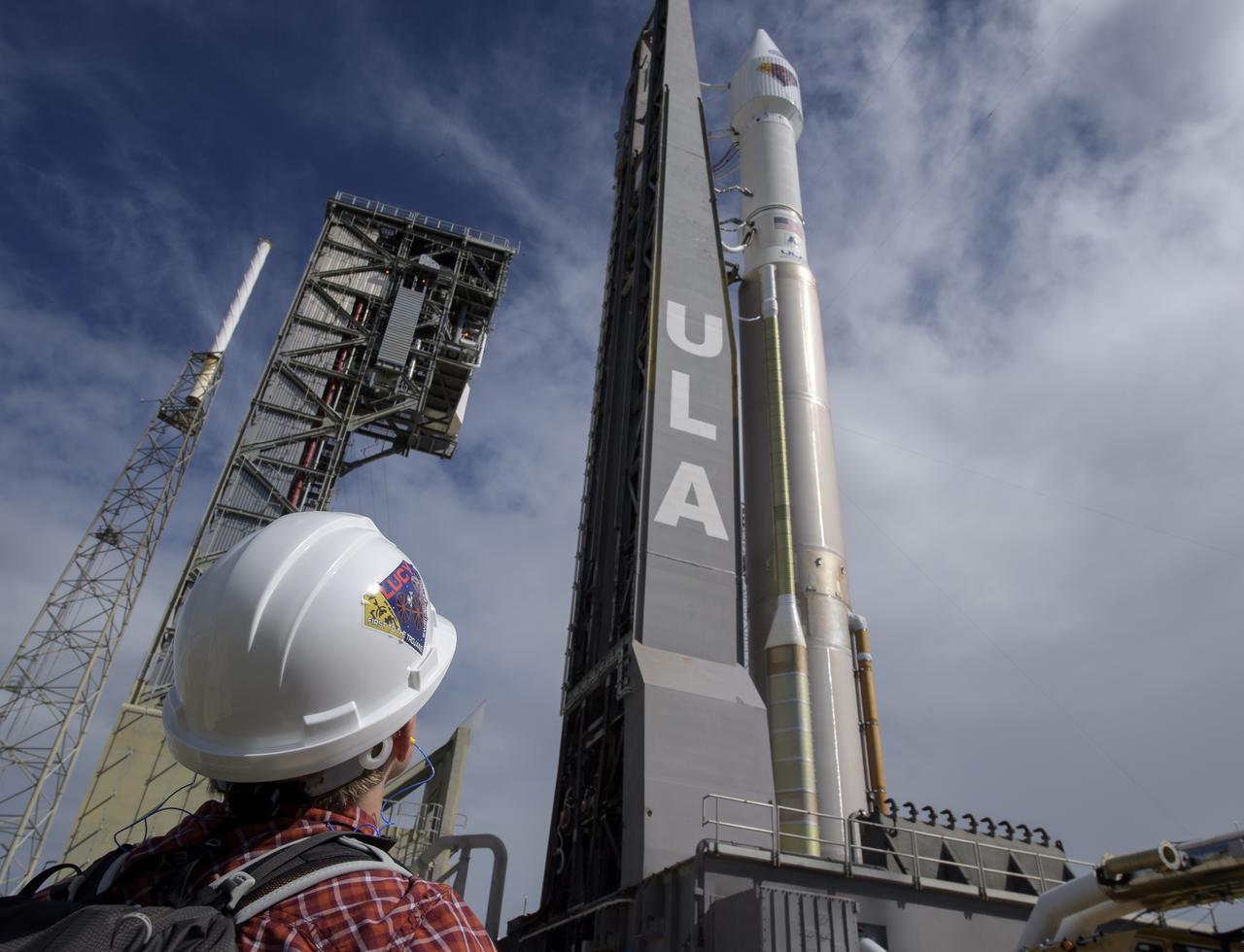 A United Launch Alliance Atlas V rocket with the Lucy spacecraft aboard is seen as it is rolled out of the Vertical Integration Facility to the launch pad at Space Launch Complex 41, Thursday, Oct. 14, 2021, at Cape Canaveral Space Force Station in Florida. Lucy will be the first spacecraft to study Jupiter's Trojan Asteroids. Like the mission's namesake – the fossilized human ancestor, "Lucy," whose skeleton provided unique insight into humanity's evolution – Lucy will revolutionize our knowledge of planetary origins and the formation of the solar system. Photo Credit: (NASA/Bill Ingalls)