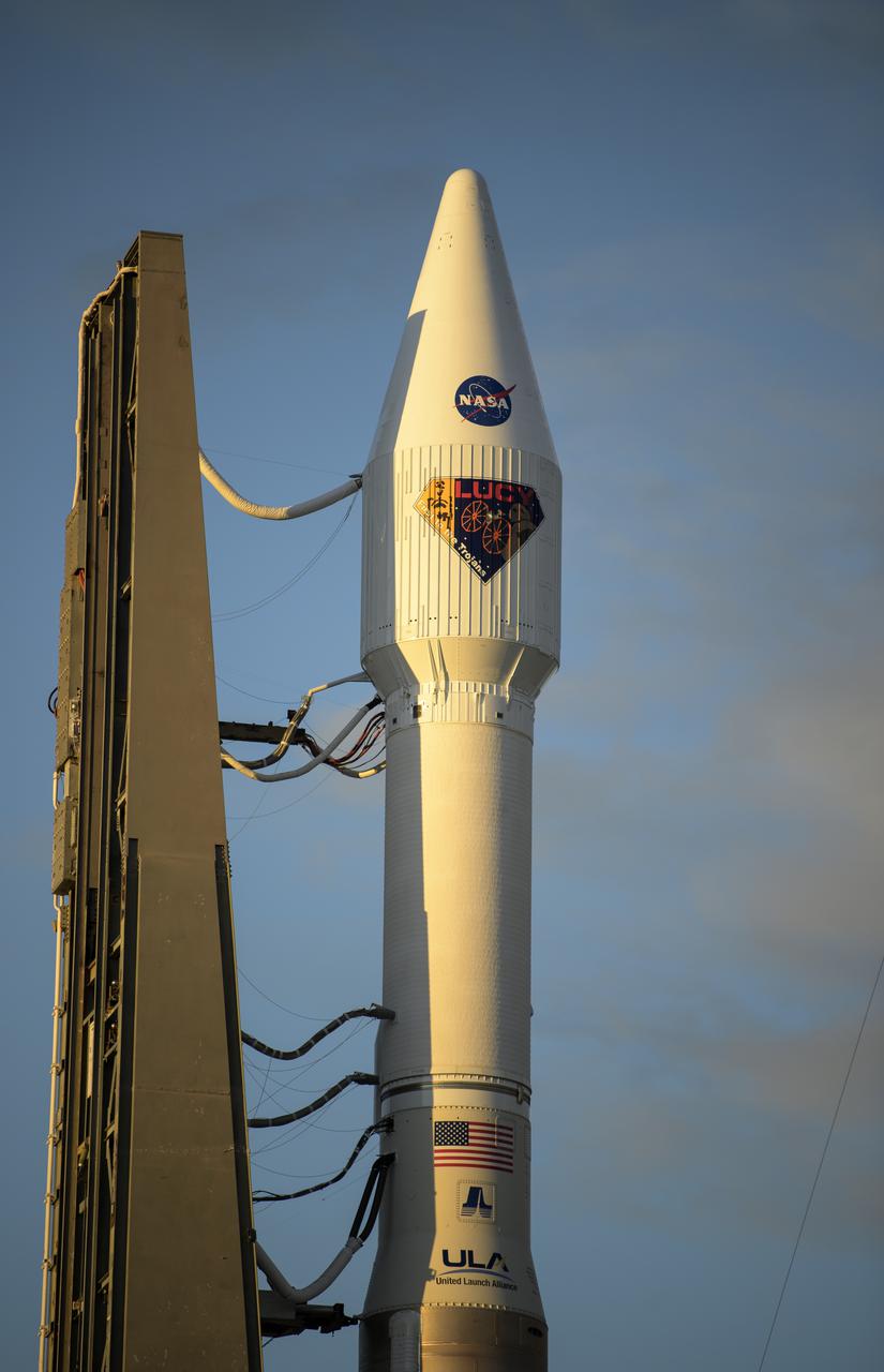 A United Launch Alliance Atlas V rocket with the Lucy spacecraft aboard is seen at Space Launch Complex 41, Thursday, Oct. 14, 2021, at Cape Canaveral Space Force Station in Florida. Lucy will be the first spacecraft to study Jupiter's Trojan Asteroids. Like the mission's namesake – the fossilized human ancestor, "Lucy," whose skeleton provided unique insight into humanity's evolution – Lucy will revolutionize our knowledge of planetary origins and the formation of the solar system. Photo Credit: (NASA/Bill Ingalls)