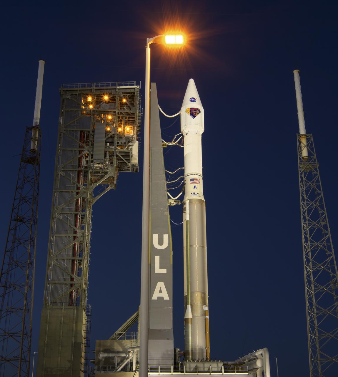 A United Launch Alliance Atlas V rocket with the Lucy spacecraft aboard is seen at Space Launch Complex 41, Thursday, Oct. 14, 2021, at Cape Canaveral Space Force Station in Florida. Lucy will be the first spacecraft to study Jupiter's Trojan Asteroids. Like the mission's namesake – the fossilized human ancestor, "Lucy," whose skeleton provided unique insight into humanity's evolution – Lucy will revolutionize our knowledge of planetary origins and the formation of the solar system. Photo Credit: (NASA/Bill Ingalls)