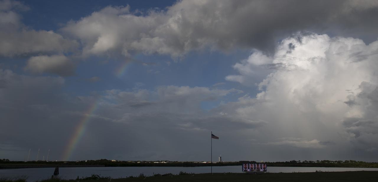 A rainbow is seen between Launch Complex 39B and Launch Complex 39A after weather moved through the area as preparations continue for NASA’s SpaceX Crew-3 mission, Monday, Oct. 25, 2021, at NASA’s Kennedy Space Center in Florida. NASA’s SpaceX Crew-3 mission is the third crew rotation mission of the SpaceX Crew Dragon spacecraft and Falcon 9 rocket to the International Space Station as part of the agency’s Commercial Crew Program. NASA astronauts Raja Chari, Tom Marshburn, Kayla Barron, and ESA (European Space Agency) astronaut Matthias Maurer are scheduled to launch on Oct. 31 at 2:21 a.m. ET, from Launch Complex 39A at the Kennedy Space Center. Photo Credit: (NASA/Joel Kowsky)