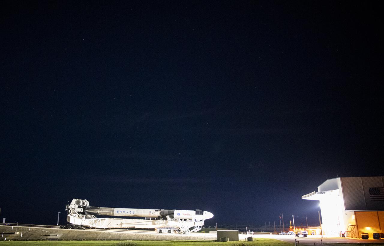 A SpaceX Falcon 9 rocket with the company's Crew Dragon spacecraft onboard is seen as it is rolled out to the launch pad at Launch Complex 39A as preparations continue for the Crew-3 mission, Wednesday, Oct. 27, 2021, at NASA’s Kennedy Space Center in Florida. NASA’s SpaceX Crew-3 mission is the third crew rotation mission of the SpaceX Crew Dragon spacecraft and Falcon 9 rocket to the International Space Station as part of the agency’s Commercial Crew Program. NASA astronauts Raja Chari, Tom Marshburn, Kayla Barron, and ESA (European Space Agency) astronaut Matthias Maurer are scheduled to launch on Oct. 31 at 2:21 a.m. ET, from Launch Complex 39A at the Kennedy Space Center. Photo Credit: (NASA/Joel Kowsky)