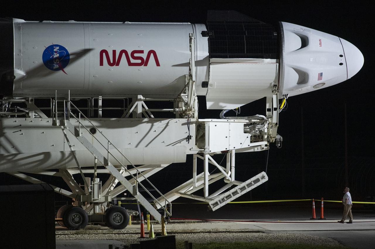 A SpaceX Falcon 9 rocket with the company's Crew Dragon spacecraft onboard is seen as it is rolled out to the launch pad at Launch Complex 39A as preparations continue for the Crew-3 mission, Wednesday, Oct. 27, 2021, at NASA’s Kennedy Space Center in Florida. NASA’s SpaceX Crew-3 mission is the third crew rotation mission of the SpaceX Crew Dragon spacecraft and Falcon 9 rocket to the International Space Station as part of the agency’s Commercial Crew Program. NASA astronauts Raja Chari, Tom Marshburn, Kayla Barron, and ESA (European Space Agency) astronaut Matthias Maurer are scheduled to launch on Oct. 31 at 2:21 a.m. ET, from Launch Complex 39A at the Kennedy Space Center. Photo Credit: (NASA/Joel Kowsky)