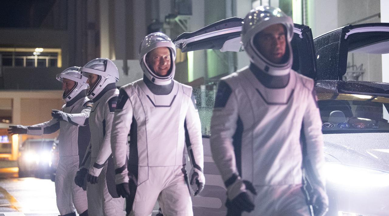 ESA (European Space Agency) astronaut Matthias Maurer, left, and NASA astronauts Tom Marshburn, second from left, Raja Chari, second from right, and Kayla Barron, right, wearing SpaceX spacesuits, are seen as they prepare to depart the Neil  A. Armstrong Operations and Checkout Building for Launch Complex 39A during a dress rehearsal prior to the Crew-3 mission launch, Thursday, Oct. 28, 2021, at NASA’s Kennedy Space Center in Florida. NASA’s SpaceX Crew-3 mission is the third crew rotation mission of the SpaceX Crew Dragon spacecraft and Falcon 9 rocket to the International Space Station as part of the agency’s Commercial Crew Program. Chari, Marshburn, Barron, Maurer are scheduled to launch at Oct. 31 at 2:21 a.m. ET, from Launch Complex 39A at the Kennedy Space Center. Photo Credit: (NASA/Joel Kowsky)
