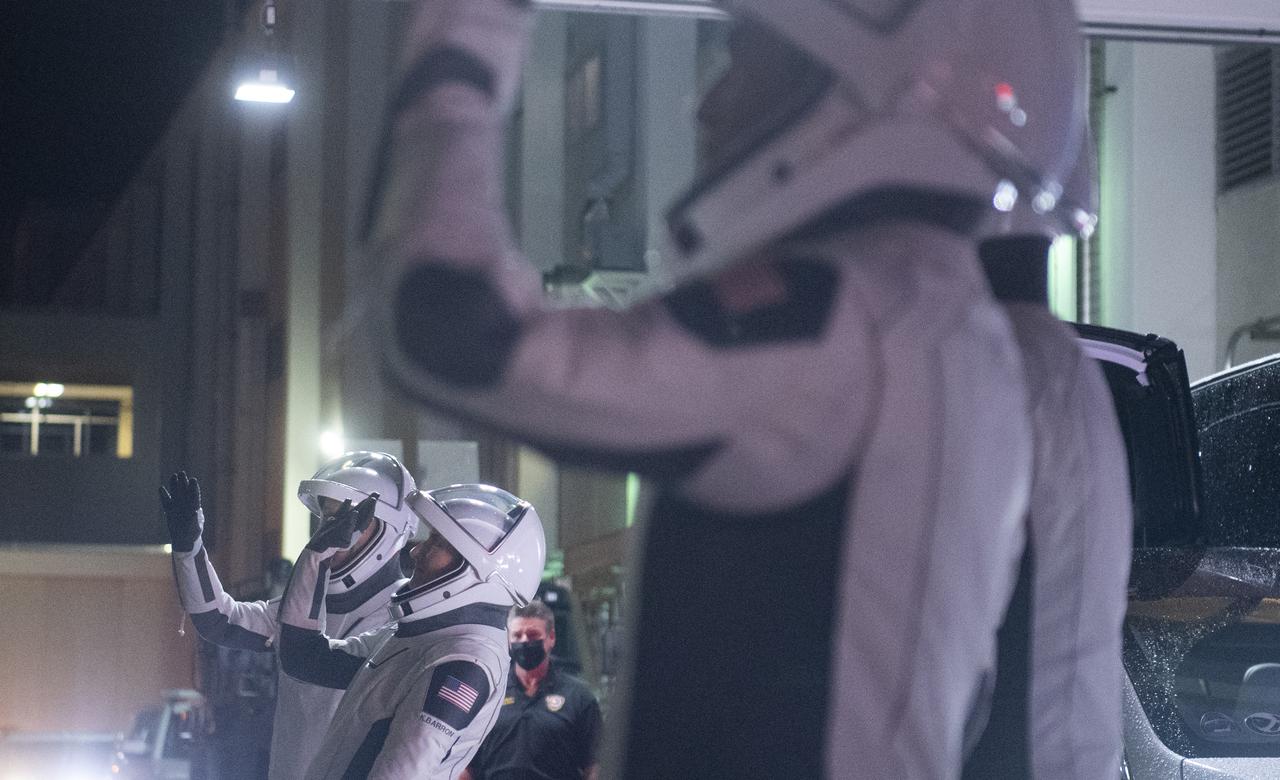 NASA astronauts Raja Chari, Tom Marshburn, Kayla Barron, and ESA (European Space Agency) astronaut Matthias Maurer, wearing SpaceX spacesuits, are seen as they prepare to depart the Neil  A. Armstrong Operations and Checkout Building for Launch Complex 39A during a dress rehearsal prior to the Crew-3 mission launch, Thursday, Oct. 28, 2021, at NASA’s Kennedy Space Center in Florida. NASA’s SpaceX Crew-3 mission is the third crew rotation mission of the SpaceX Crew Dragon spacecraft and Falcon 9 rocket to the International Space Station as part of the agency’s Commercial Crew Program. Chari, Marshburn, Barron, Maurer are scheduled to launch at Oct. 31 at 2:21 a.m. ET, from Launch Complex 39A at the Kennedy Space Center. Photo Credit: (NASA/Joel Kowsky)