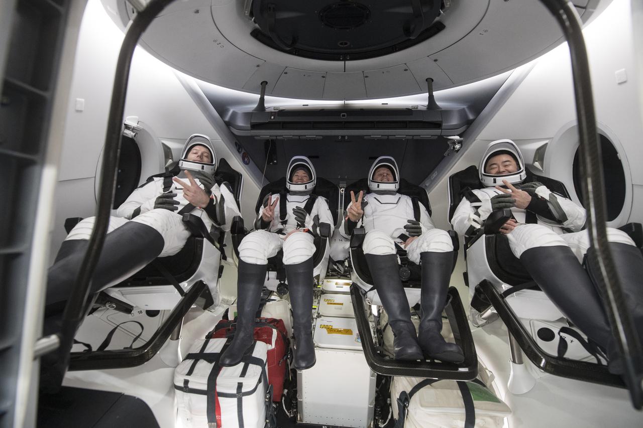 ESA (European Space Agency) astronaut Thomas Pesquet, left, NASA astronauts Megan McArthur and Shane Kimbrough, and Japan Aerospace Exploration Agency (JAXA) astronaut Aki Hoshide, right, are seen inside the SpaceX Crew Dragon Endeavour spacecraft onboard the SpaceX GO Navigator recovery ship shortly after having landed in the Gulf of Mexico off the coast of Pensacola, Florida, Monday, Nov. 8, 2021. NASA’s SpaceX Crew-2 mission is the second operational mission of the SpaceX Crew Dragon spacecraft and Falcon 9 rocket to the International Space Station as part of the agency’s Commercial Crew Program. Photo Credit: (NASA/Aubrey Gemignani)