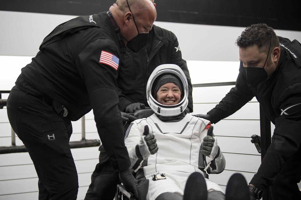 NASA astronaut Megan McArthur gives a thumbs up after being helped out of the SpaceX Crew Dragon Endeavour spacecraft onboard the SpaceX GO Navigator recovery ship after she and NASA astronaut Shane Kimbrough, Japan Aerospace Exploration Agency (JAXA) astronaut Aki Hoshide, and ESA (European Space Agency) astronaut Thomas Pesquet landed in the Gulf of Mexico off the coast of Pensacola, Florida, Monday, Nov. 8, 2021. NASA’s SpaceX Crew-2 mission is the second operational mission of the SpaceX Crew Dragon spacecraft and Falcon 9 rocket to the International Space Station as part of the agency’s Commercial Crew Program. Photo Credit: (NASA/Aubrey Gemignani)