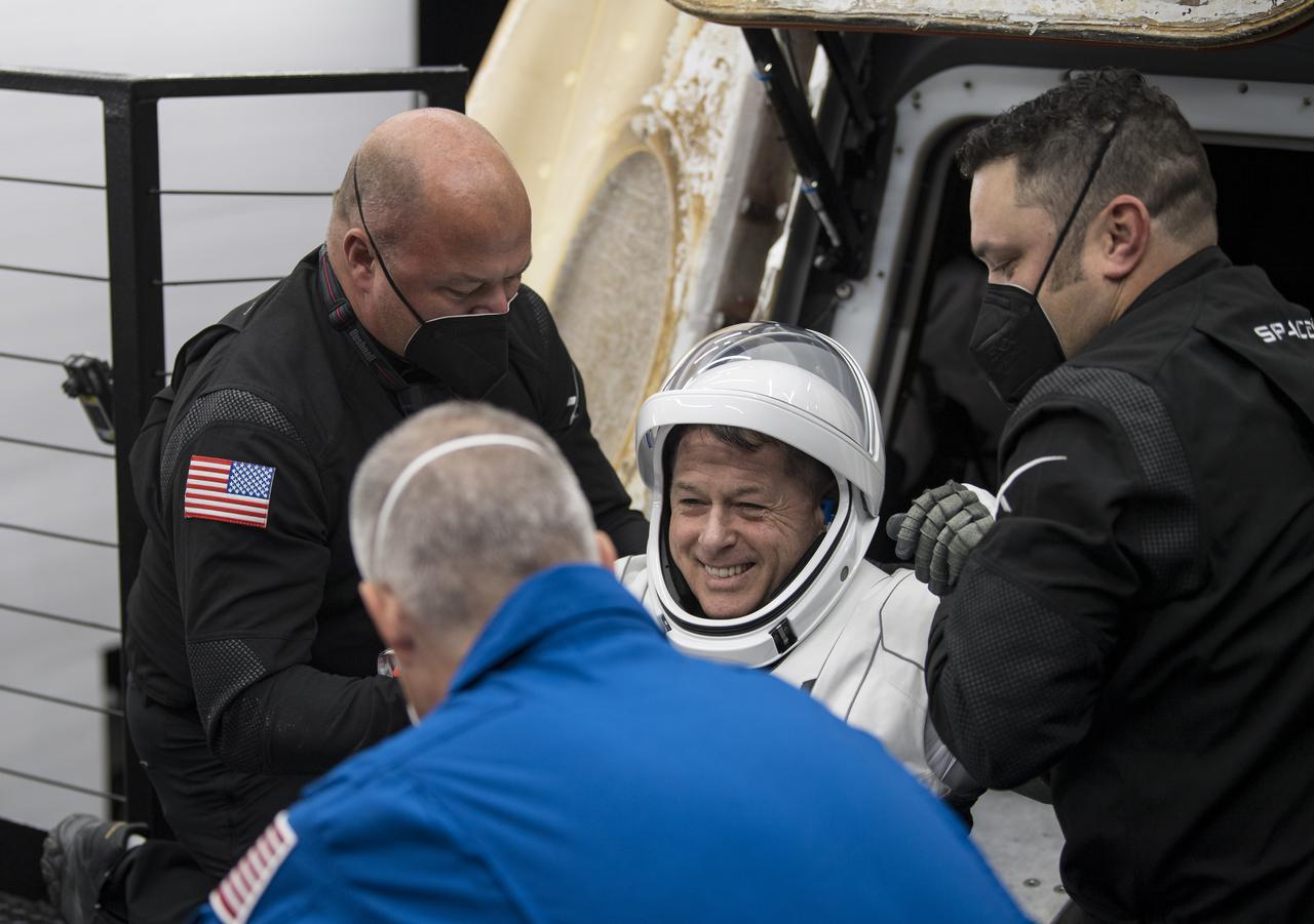 NASA astronaut Shane Kimbrough is helped out of the SpaceX Crew Dragon Endeavour spacecraft onboard the SpaceX GO Navigator recovery ship after he and NASA astronaut Megan McArthur, Japan Aerospace Exploration Agency (JAXA) astronaut Aki Hoshide, and ESA (European Space Agency) astronaut Thomas Pesquet landed in the Gulf of Mexico off the coast of Pensacola, Florida, Monday, Nov. 8, 2021. NASA’s SpaceX Crew-2 mission is the second operational mission of the SpaceX Crew Dragon spacecraft and Falcon 9 rocket to the International Space Station as part of the agency’s Commercial Crew Program. Photo Credit: (NASA/Aubrey Gemignani)