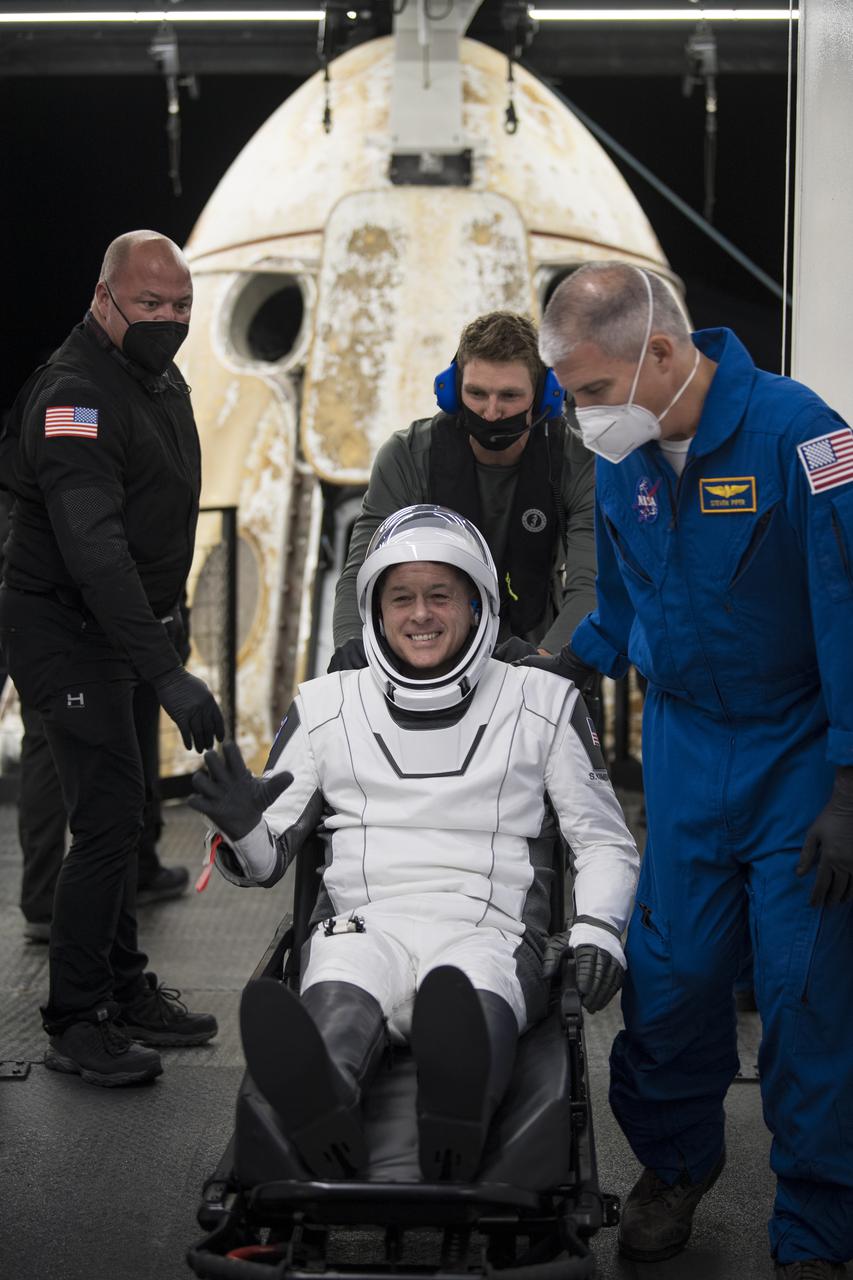 NASA astronaut Shane Kimbrough is seen after being helped out of the SpaceX Crew Dragon Endeavour spacecraft onboard the SpaceX GO Navigator recovery ship after he and NASA astronaut Megan McArthur, Japan Aerospace Exploration Agency (JAXA) astronaut Aki Hoshide, and ESA (European Space Agency) astronaut Thomas Pesquet landed in the Gulf of Mexico off the coast of Pensacola, Florida, Monday, Nov. 8, 2021. NASA’s SpaceX Crew-2 mission is the second operational mission of the SpaceX Crew Dragon spacecraft and Falcon 9 rocket to the International Space Station as part of the agency’s Commercial Crew Program. Photo Credit: (NASA/Aubrey Gemignani)