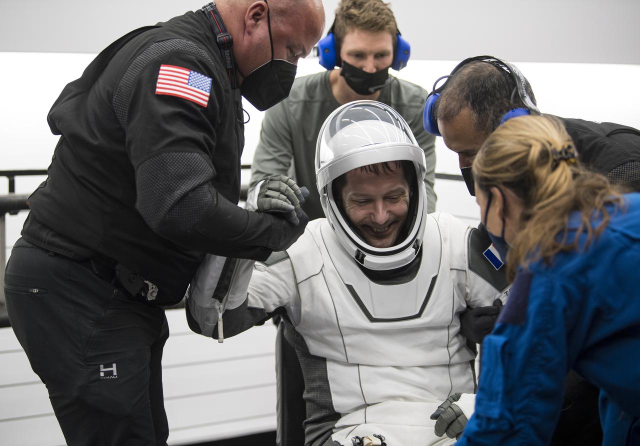 ESA (European Space Agency) astronaut Thomas Pesquet is helped out of the SpaceX Crew Dragon Endeavour spacecraft onboard the SpaceX GO Navigator recovery ship after he and NASA astronauts Shane Kimbrough and Megan McArthur, and Japan Aerospace Exploration Agency (JAXA) astronaut Aki Hoshide landed in the Gulf of Mexico off the coast of Pensacola, Florida, Monday, Nov. 8, 2021. NASA’s SpaceX Crew-2 mission is the second operational mission of the SpaceX Crew Dragon spacecraft and Falcon 9 rocket to the International Space Station as part of the agency’s Commercial Crew Program. Photo Credit: (NASA/Aubrey Gemignani)