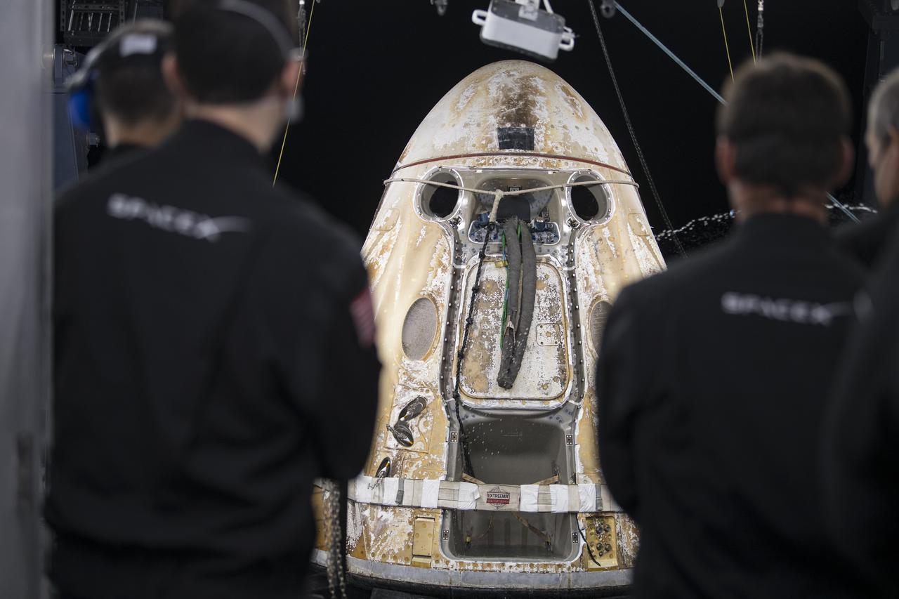 The SpaceX Crew Dragon Endeavour spacecraft is seen as it is lifted onto the SpaceX GO Navigator recovery ship shortly after having landed in the Gulf of Mexico off the coast of Pensacola, Florida with NASA astronauts Shane Kimbrough and Megan McArthur, Japan Aerospace Exploration Agency (JAXA) astronaut Aki Hoshide, and ESA (European Space Agency) astronaut Thomas Pesquet aboard, Monday, Nov. 8, 2021. NASA’s SpaceX Crew-2 mission is the second operational mission of the SpaceX Crew Dragon spacecraft and Falcon 9 rocket to the International Space Station as part of the agency’s Commercial Crew Program. Photo Credit: (NASA/Aubrey Gemignani)