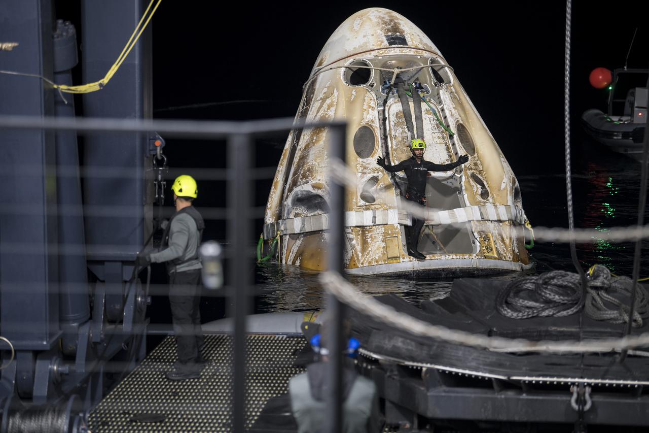Support teams work around the SpaceX Crew Dragon Endeavour spacecraft shortly after it landed with NASA astronauts Shane Kimbrough and Megan McArthur, Japan Aerospace Exploration Agency (JAXA) astronaut Aki Hoshide, and ESA (European Space Agency) astronaut Thomas Pesquet aboard in the Gulf of Mexico off the coast of Pensacola, Florida, Monday, Nov. 8, 2021. NASA’s SpaceX Crew-2 mission is the second operational mission of the SpaceX Crew Dragon spacecraft and Falcon 9 rocket to the International Space Station as part of the agency’s Commercial Crew Program. Photo Credit: (NASA/Aubrey Gemignani)