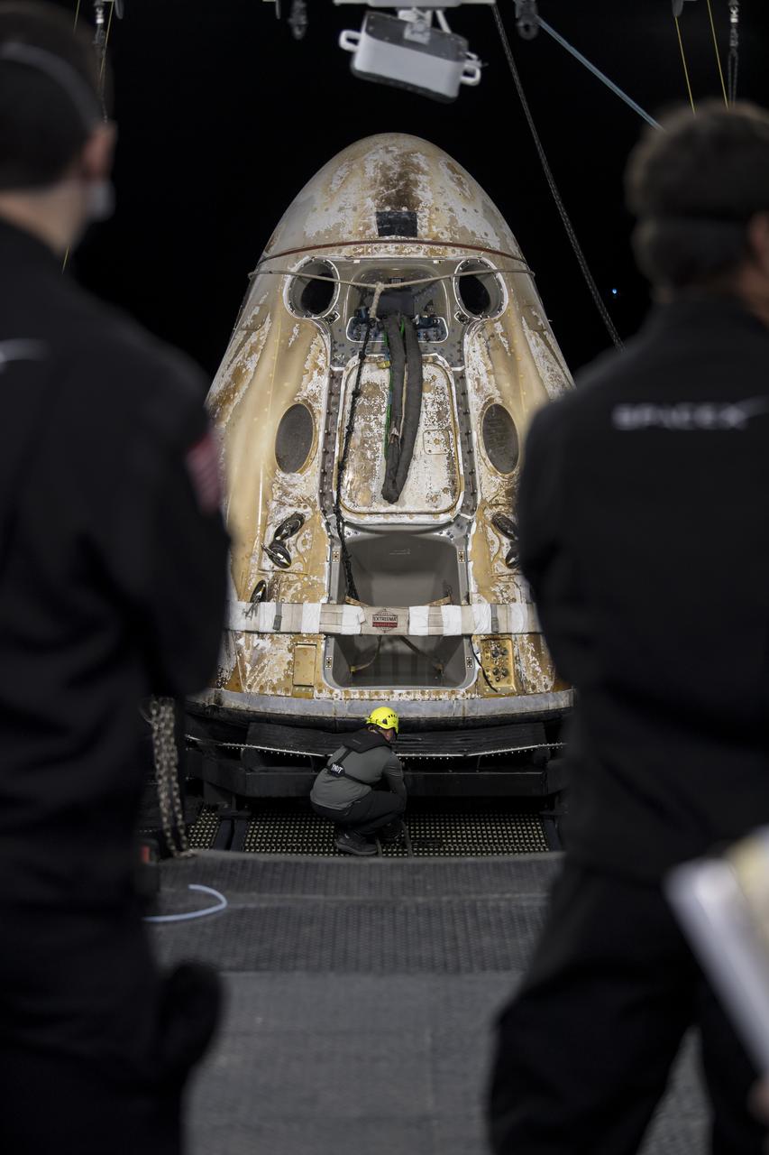 Support teams work around the SpaceX Crew Dragon Endeavour spacecraft shortly after it landed with NASA astronauts Shane Kimbrough and Megan McArthur, Japan Aerospace Exploration Agency (JAXA) astronaut Aki Hoshide, and ESA (European Space Agency) astronaut Thomas Pesquet aboard in the Gulf of Mexico off the coast of Pensacola, Florida, Monday, Nov. 8, 2021. NASA’s SpaceX Crew-2 mission is the second operational mission of the SpaceX Crew Dragon spacecraft and Falcon 9 rocket to the International Space Station as part of the agency’s Commercial Crew Program. Photo Credit: (NASA/Aubrey Gemignani)