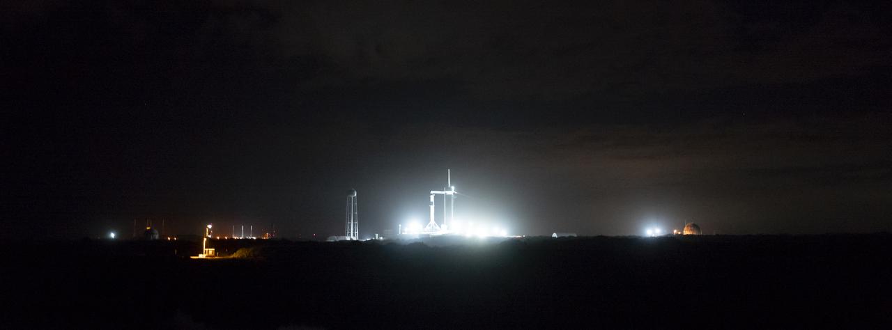 A SpaceX Falcon 9 rocket with the company's Crew Dragon spacecraft onboard is seen on the launch pad at Launch Complex 39A as preparations continue for the Crew-3 mission, Tuesday, Nov. 9, 2021, at NASA’s Kennedy Space Center in Florida. NASA’s SpaceX Crew-3 mission is the third crew rotation mission of the SpaceX Crew Dragon spacecraft and Falcon 9 rocket to the International Space Station as part of the agency’s Commercial Crew Program. NASA astronauts Raja Chari, Tom Marshburn, Kayla Barron, and ESA (European Space Agency) astronaut Matthias Maurer are scheduled to launch on no earlier than Nov. 10 at 9:03 p.m. EST, from Launch Complex 39A at the Kennedy Space Center. Photo Credit: (NASA/Joel Kowsky)