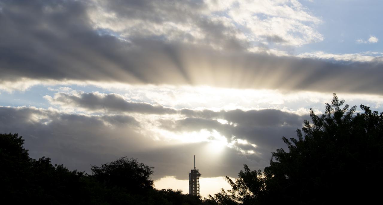 A SpaceX Falcon 9 rocket with the company's Crew Dragon spacecraft onboard is seen at sunrise on the launch pad at Launch Complex 39A as preparations continue for the Crew-3 mission, Wednesday, Nov. 10, 2021, at NASA’s Kennedy Space Center in Florida. NASA’s SpaceX Crew-3 mission is the third crew rotation mission of the SpaceX Crew Dragon spacecraft and Falcon 9 rocket to the International Space Station as part of the agency’s Commercial Crew Program. NASA astronauts Raja Chari, Tom Marshburn, Kayla Barron, and ESA (European Space Agency) astronaut Matthias Maurer are scheduled to launch at 9:03 p.m. EST, from Launch Complex 39A at the Kennedy Space Center. Photo Credit: (NASA/Joel Kowsky)