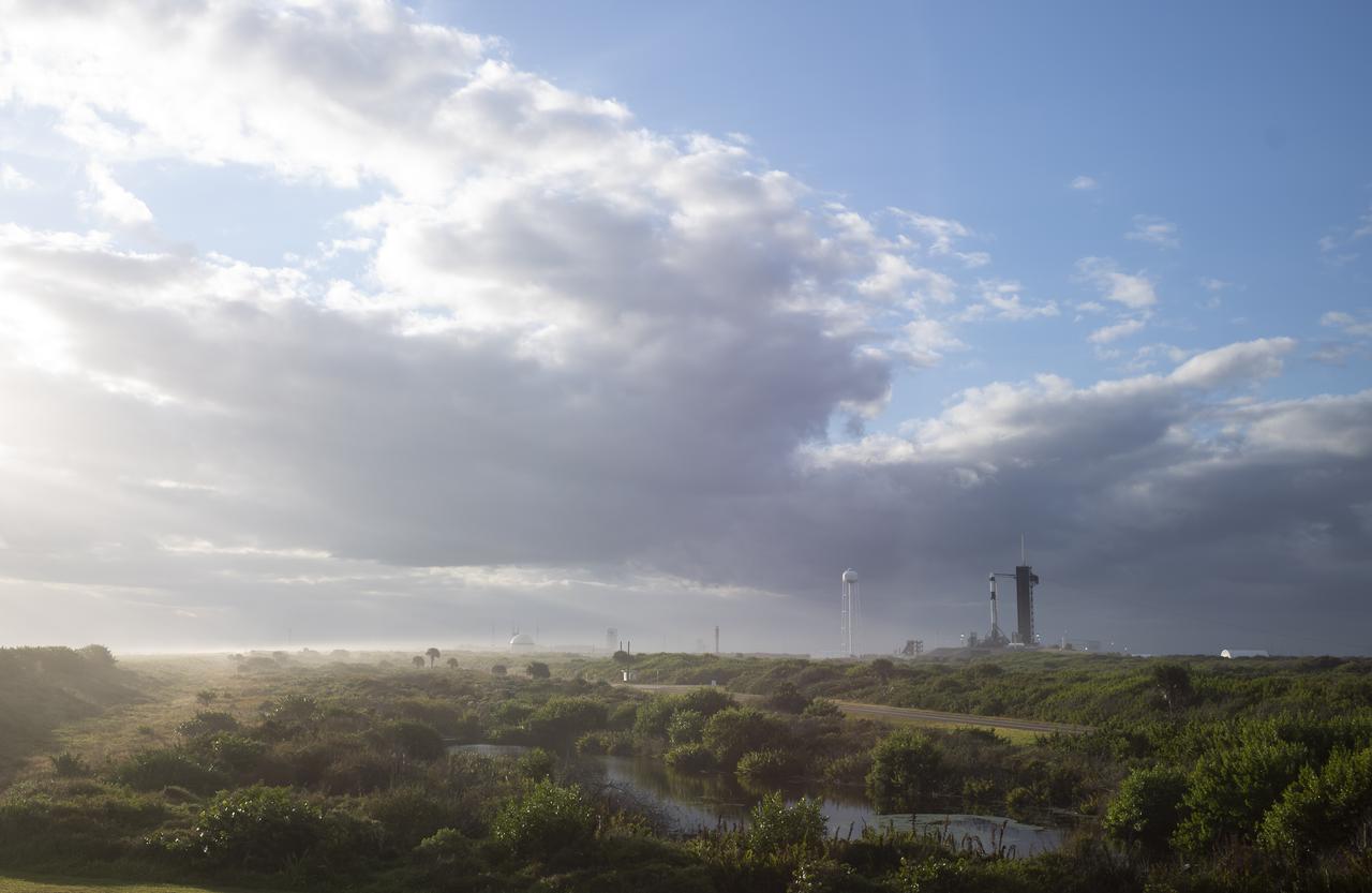 A SpaceX Falcon 9 rocket with the company's Crew Dragon spacecraft onboard is seen on the launch pad at Launch Complex 39A as preparations continue for the Crew-3 mission, Wednesday, Nov. 10, 2021, at NASA’s Kennedy Space Center in Florida. NASA’s SpaceX Crew-3 mission is the third crew rotation mission of the SpaceX Crew Dragon spacecraft and Falcon 9 rocket to the International Space Station as part of the agency’s Commercial Crew Program. NASA astronauts Raja Chari, Tom Marshburn, Kayla Barron, and ESA (European Space Agency) astronaut Matthias Maurer are scheduled to launch at 9:03 p.m. EST, from Launch Complex 39A at the Kennedy Space Center. Photo Credit: (NASA/Joel Kowsky)
