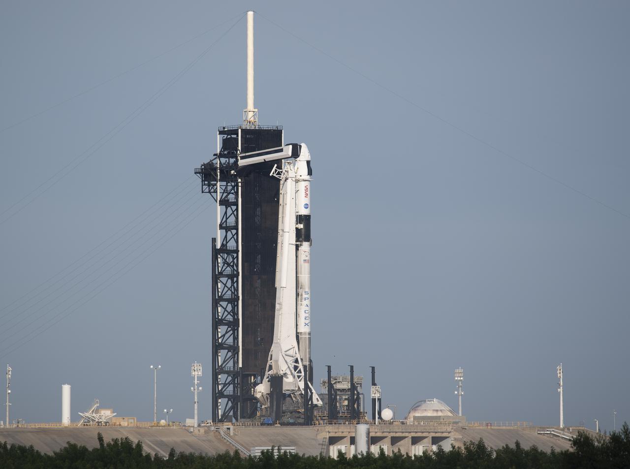 A SpaceX Falcon 9 rocket with the company's Crew Dragon spacecraft onboard is seen on the launch pad at Launch Complex 39A as preparations continue for the Crew-3 mission, Wednesday, Nov. 10, 2021, at NASA’s Kennedy Space Center in Florida. NASA’s SpaceX Crew-3 mission is the third crew rotation mission of the SpaceX Crew Dragon spacecraft and Falcon 9 rocket to the International Space Station as part of the agency’s Commercial Crew Program. NASA astronauts Raja Chari, Tom Marshburn, Kayla Barron, and ESA (European Space Agency) astronaut Matthias Maurer are scheduled to launch at 9:03 p.m. EST, from Launch Complex 39A at the Kennedy Space Center. Photo Credit: (NASA/Joel Kowsky)