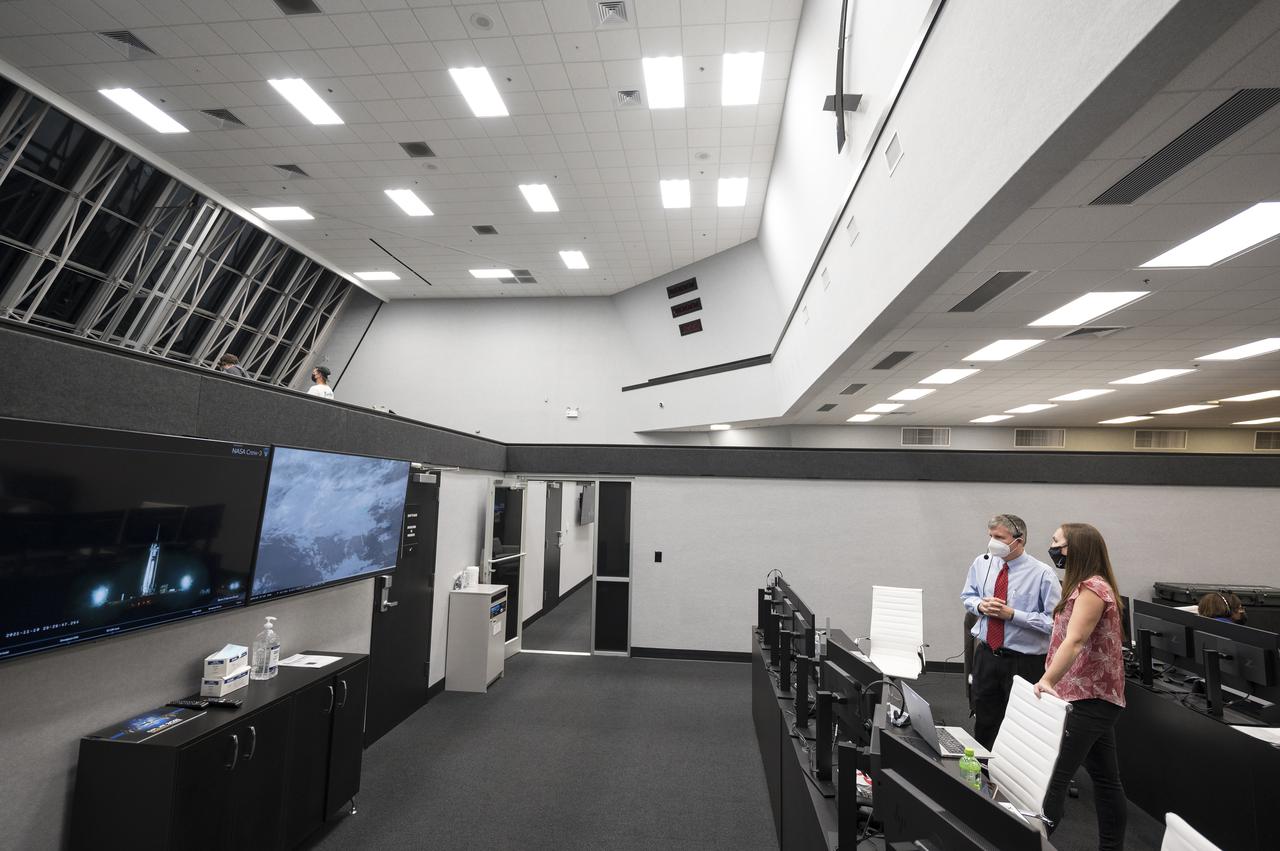 Steve Stich, manager of NASA’s Commercial Crew Program, and Sarah Walker, director of Dragon Mission Management at SpaceX, monitor the countdown of the launch of a SpaceX Falcon 9 rocket carrying the company's Crew Dragon spacecraft on NASA’s SpaceX Crew-3 mission with NASA astronauts Raja Chari, Tom Marshburn, Kayla Barron, and ESA (European Space Agency) astronaut Matthias Maurer onboard, Wednesday, Nov. 10, 2021, in firing room four of the Launch Control Center at NASA’s Kennedy Space Center in Florida. NASA’s SpaceX Crew-3 mission is the first crew rotation mission of the SpaceX Crew Dragon spacecraft and Falcon 9 rocket to the International Space Station as part of the agency’s Commercial Crew Program. Chari, Marshburn, Barron, Maurer are scheduled to launch at 9:03 p.m. EST, from Launch Complex 39A at the Kennedy Space Center. Photo Credit: (NASA/Aubrey Gemignani)