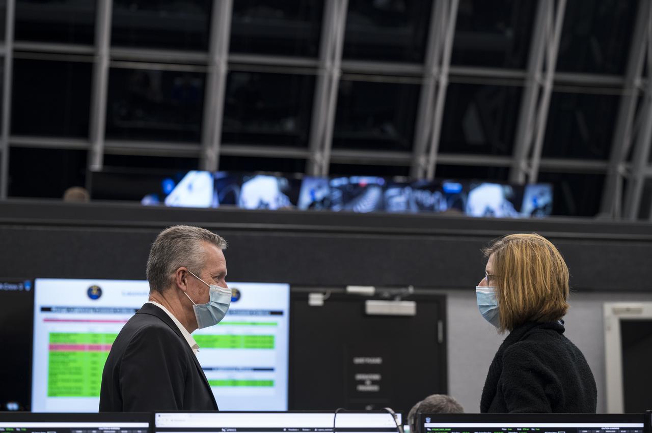 Phil McAlister, director of Commercial Spaceflight at NASA, left, and Kathy Lueders, associate administrator for NASA's Space Operations Mission Directorate, monitor the countdown of the launch of a SpaceX Falcon 9 rocket carrying the company's Crew Dragon spacecraft on NASA’s SpaceX Crew-3 mission with NASA astronauts Raja Chari, Tom Marshburn, Kayla Barron, and ESA (European Space Agency) astronaut Matthias Maurer onboard, Wednesday, Nov. 10, 2021, in firing room four of the Launch Control Center at NASA’s Kennedy Space Center in Florida. NASA’s SpaceX Crew-3 mission is the first crew rotation mission of the SpaceX Crew Dragon spacecraft and Falcon 9 rocket to the International Space Station as part of the agency’s Commercial Crew Program. Chari, Marshburn, Barron, Maurer are scheduled to launch at 9:03 p.m. EST, from Launch Complex 39A at the Kennedy Space Center. Photo Credit: (NASA/Aubrey Gemignani)