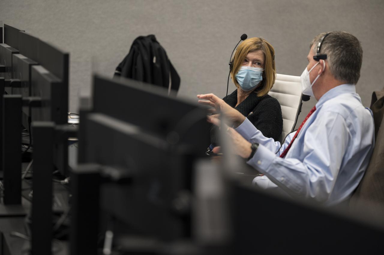 Kathy Lueders, associate administrator for NASA's Space Operations Mission Directorate, left, and Steve Stich, manager of NASA’s Commercial Crew Program, monitor the countdown of the launch of a SpaceX Falcon 9 rocket carrying the company's Crew Dragon spacecraft on NASA’s SpaceX Crew-3 mission with NASA astronauts Raja Chari, Tom Marshburn, Kayla Barron, and ESA (European Space Agency) astronaut Matthias Maurer onboard, Wednesday, Nov. 10, 2021, in firing room four of the Launch Control Center at NASA’s Kennedy Space Center in Florida. NASA’s SpaceX Crew-3 mission is the first crew rotation mission of the SpaceX Crew Dragon spacecraft and Falcon 9 rocket to the International Space Station as part of the agency’s Commercial Crew Program. Chari, Marshburn, Barron, Maurer are scheduled to launch at 9:03 p.m. EST, from Launch Complex 39A at the Kennedy Space Center. Photo Credit: (NASA/Aubrey Gemignani)