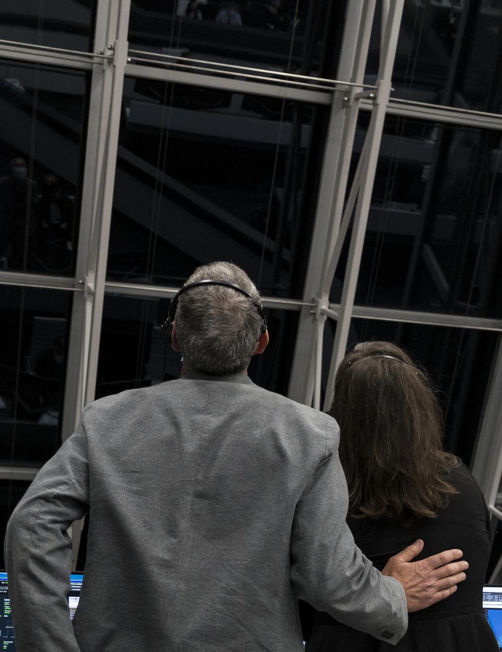 Lee Rosen, vice president of Mission and Launch Operations at SpaceX, left, and Holly Ridings, NASA's chief flight director, monitor the launch of a SpaceX Falcon 9 rocket carrying the company's Crew Dragon spacecraft on the Crew-3 mission with NASA astronauts Raja Chari, Tom Marshburn, Kayla Barron, and ESA (European Space Agency) astronaut Matthias Maurer onboard, Wednesday, Nov. 10, 2021, in  firing room four of the Launch Control Center at NASA’s Kennedy Space Center in Florida. NASA’s SpaceX Crew-3 mission is the third crew rotation mission of the SpaceX Crew Dragon spacecraft and Falcon 9 rocket to the International Space Station as part of the agency’s Commercial Crew Program. Chari, Marshburn, Barron, Maurer launched at 9:03 p.m. EST, from Launch Complex 39A at the Kennedy Space Center. Photo Credit: (NASA/Aubrey Gemignani)