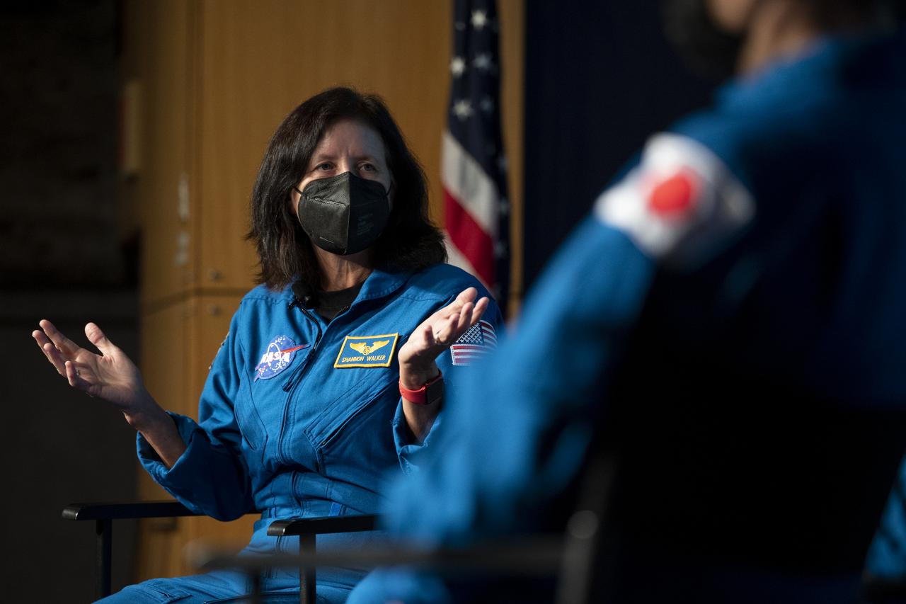 NASA astronaut Shannon Walker speaks with employees of the Space Operations and Exploration Systems Development Mission Directorates about the Crew-1 mission with fellow crew members NASA astronauts Mike Hopkins, Victor Glover, and Japan Aerospace Exploration Agency (JAXA) astronaut Soichi Noguchi, Monday, Nov. 15, 2021, at the Mary W. Jackson NASA Headquarters Building in Washington. Hopkins, Glover, Walker, and Noguchi launched on the first crew rotation mission to the International Space Station for SpaceX’s Falcon 9 and Crew Dragon spacecraft as part of the agency’s Commercial Crew Program and spent 168 days in space across Expeditions 64 and 65. Photo Credit: (NASA/Joel Kowsky)