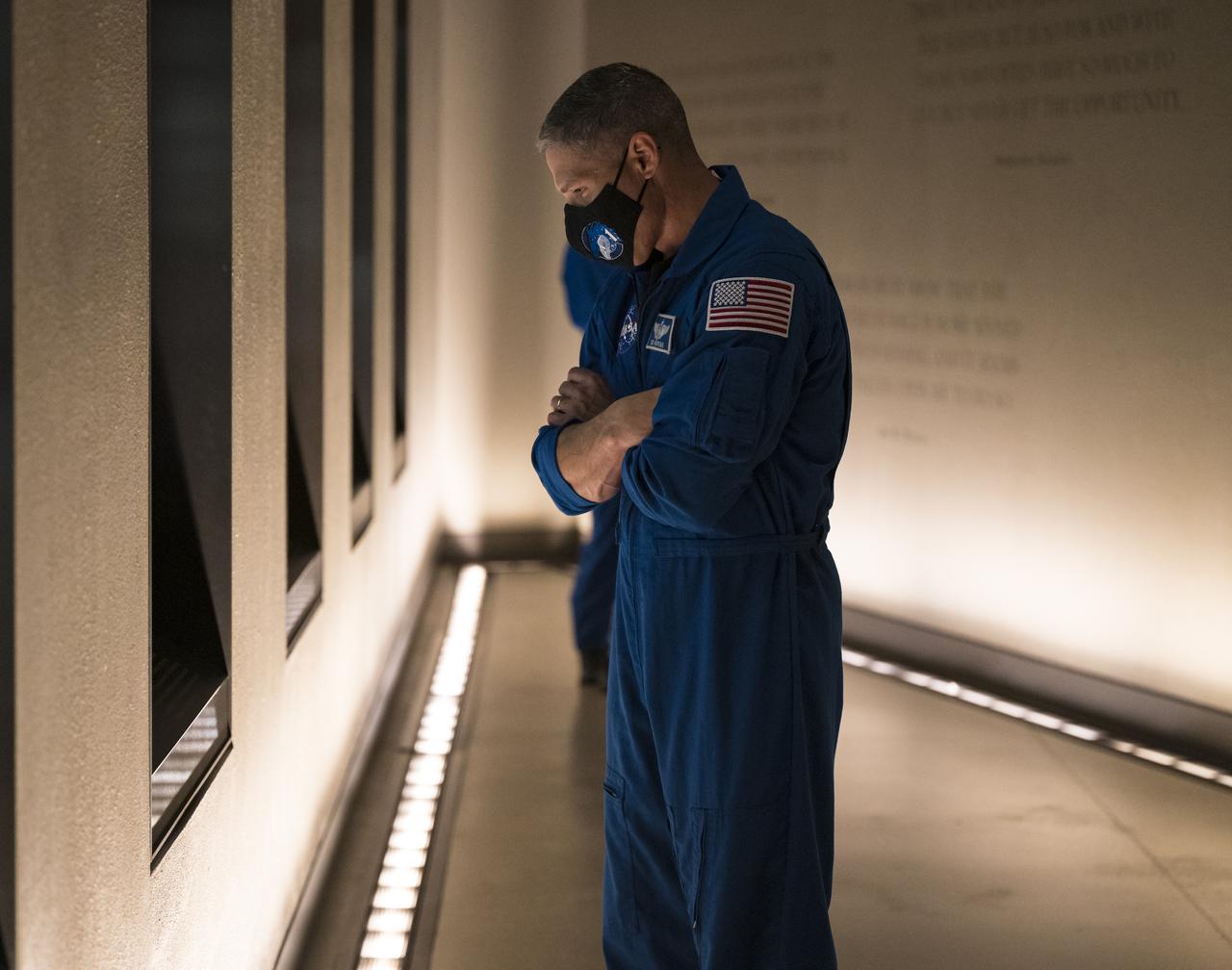 SpaceX Crew-1 NASA astronaut Mike Hopkins, is seen during a tour of the National Museum of African American History and Culture, Tuesday, Nov. 16, 2021, in Washington. Hopkins and crew mates NASA astronauts Shannon Walker and Victor Glover, and Japan Aerospace Exploration Agency (JAXA) astronaut Soichi Noguchi, launched on the first crew rotation mission to the International Space Station for SpaceX’s Falcon 9 and Crew Dragon spacecraft as part of the agency’s Commercial Crew Program and spent 168 days in space across Expeditions 64 and 65. Photo Credit: (NASA/Aubrey Gemignani)