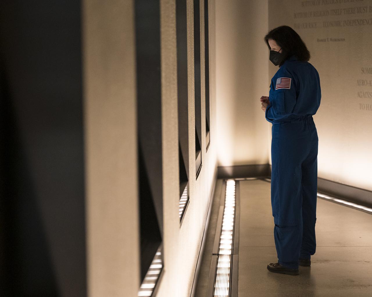 SpaceX Crew-1 NASA astronaut Shannon Walker is seen during a tour of the National Museum of African American History and Culture, Tuesday, Nov. 16, 2021, in Washington. Walker and her crew mates NASA astronauts  Mike Hopkins and Victor Glover, and Japan Aerospace Exploration Agency (JAXA) astronaut Soichi Noguchi, launched on the first crew rotation mission to the International Space Station for SpaceX’s Falcon 9 and Crew Dragon spacecraft as part of the agency’s Commercial Crew Program and spent 168 days in space across Expeditions 64 and 65. Photo Credit: (NASA/Aubrey Gemignani)