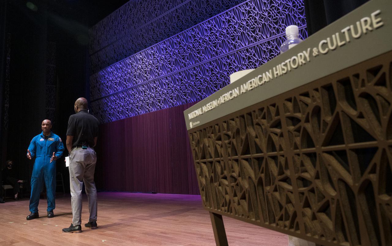 SpaceX Crew-1 NASA astronaut Victor Glover is interviewed in the Oprah Winfrey Theater at the National Museum of African American History and Culture, Tuesday, Nov. 16, 2021, in Washington. Glover and crew mates NASA astronauts Shannon Walker and Mike Hopkins, and Japan Aerospace Exploration Agency (JAXA) astronaut Soichi Noguchi, launched on the first crew rotation mission to the International Space Station for SpaceX’s Falcon 9 and Crew Dragon spacecraft as part of the agency’s Commercial Crew Program and spent 168 days in space across Expeditions 64 and 65. Photo Credit: (NASA/Aubrey Gemignani)