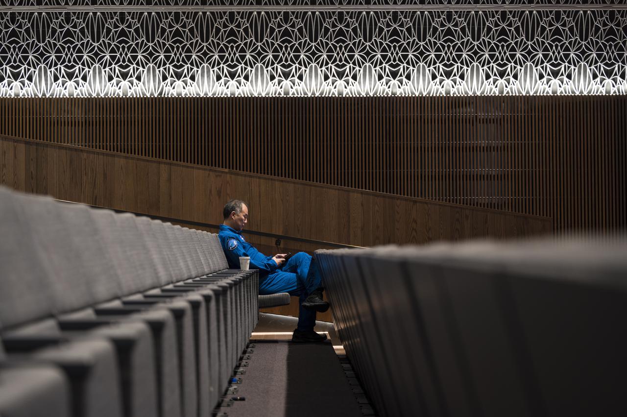 Japan Aerospace Exploration Agency (JAXA) astronaut Soichi Noguchi takes a break in the Oprah Winfrey Theater during a tour of the National Museum of African American History and Culture with fellow SpaceX Crew-1 NASA astronauts, Shannon Walker, Victor Glover, and Mike Hopkins, Tuesday, Nov. 16, 2021, in Washington. Hopkins, Glover, Walker, and Noguchi launched on the first crew rotation mission to the International Space Station for SpaceX’s Falcon 9 and Crew Dragon spacecraft as part of the agency’s Commercial Crew Program and spent 168 days in space across Expeditions 64 and 65. Photo Credit: (NASA/Aubrey Gemignani)