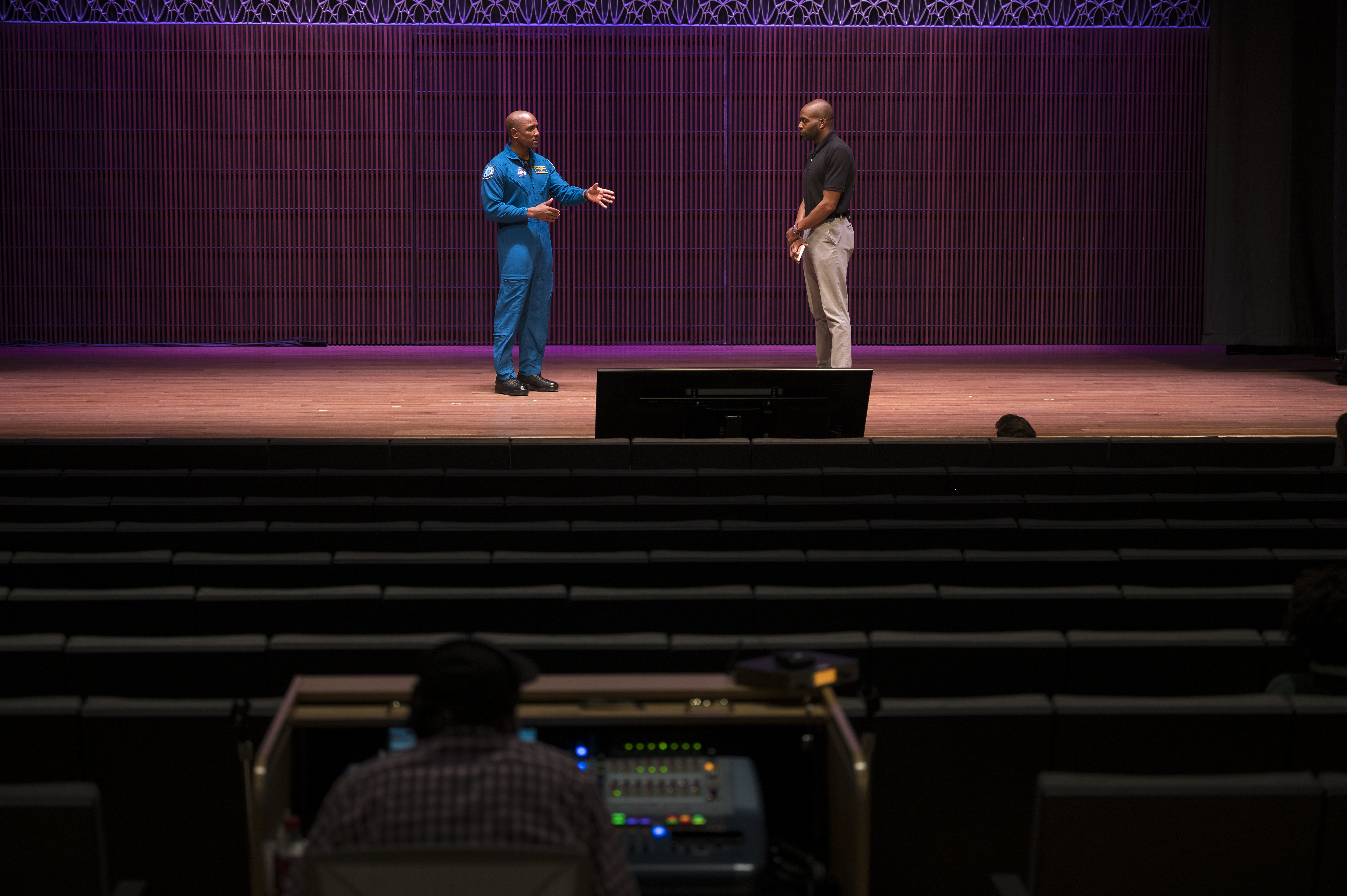 SpaceX Crew-1 NASA astronaut Victor Glover is interviewed by Christopher Williams, STEM educator at the National Museum of African American History and Culture (NMAAHC) in the Oprah Winfrey Theater at the NMAAHC, Tuesday, Nov. 16, 2021, in Washington. Glover and crew mates NASA astronauts Shannon Walker and Mike Hopkins, and Japan Aerospace Exploration Agency (JAXA) astronaut Soichi Noguchi, launched on the first crew rotation mission to the International Space Station for SpaceX’s Falcon 9 and Crew Dragon spacecraft as part of the agency’s Commercial Crew Program and spent 168 days in space across Expeditions 64 and 65. Photo Credit: (NASA/Aubrey Gemignani)
