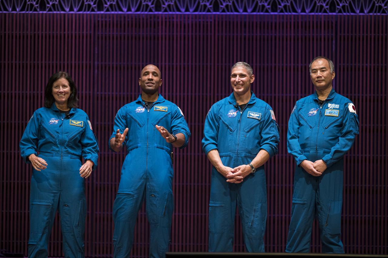 SpaceX Crew-1 NASA astronauts, from left to right, Shannon Walker, Victor Glover, Mike Hopkins, and Japan Aerospace Exploration Agency (JAXA) astronaut Soichi Noguchi, give a presentation about their mission in the Oprah Winfrey Theater at the National Museum of African American History and Culture, Tuesday, Nov. 16, 2021, in Washington. Hopkins, Glover, Walker, and Noguchi launched on the first crew rotation mission to the International Space Station for SpaceX’s Falcon 9 and Crew Dragon spacecraft as part of the agency’s Commercial Crew Program and spent 168 days in space across Expeditions 64 and 65. Photo Credit: (NASA/Aubrey Gemignani)