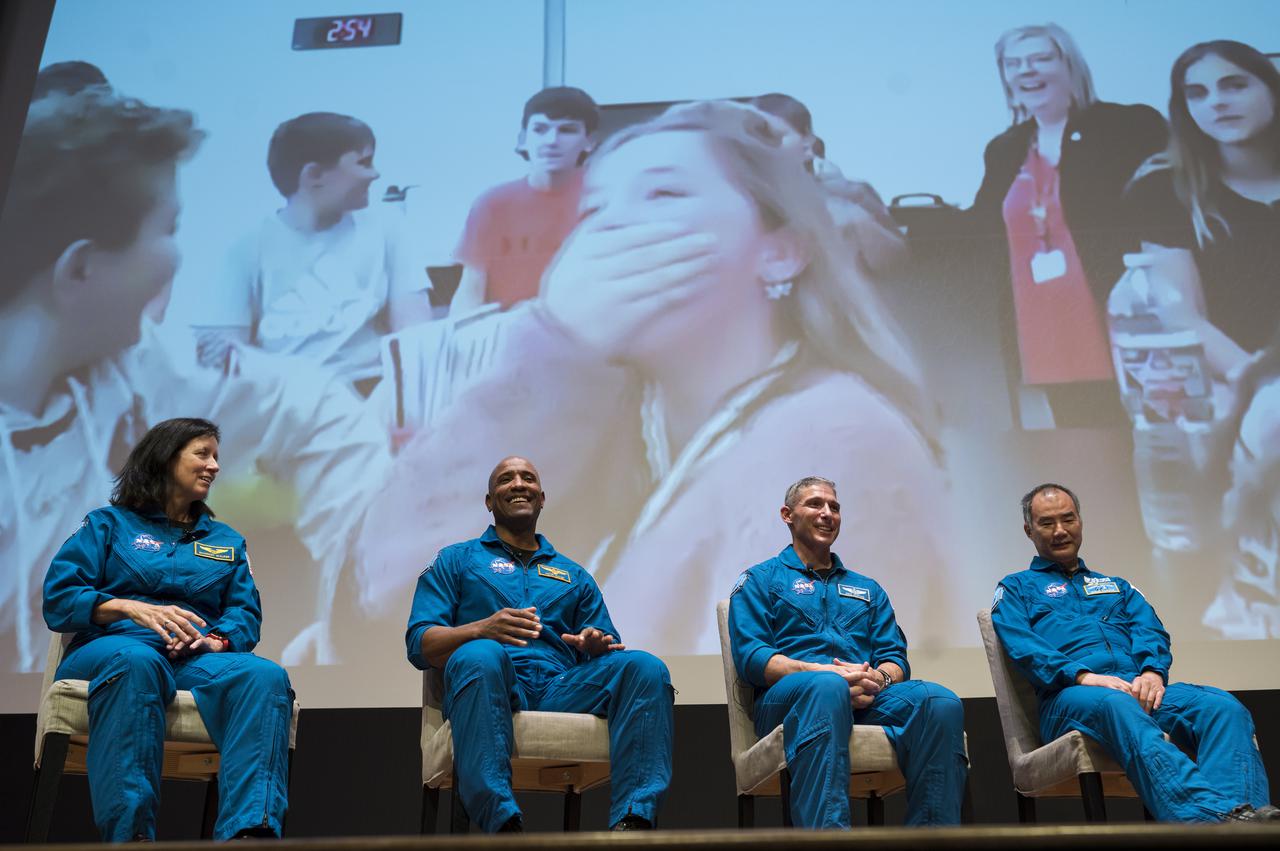 Students react as SpaceX Crew-1 NASA astronauts, from left to right, Shannon Walker, Victor Glover, Mike Hopkins, and Japan Aerospace Exploration Agency (JAXA) astronaut Soichi Noguchi answer questions during a live question and answer session in the Oprah Winfrey Theater at the National Museum of African American History and Culture, Tuesday, Nov. 16, 2021, in Washington. Hopkins, Glover, Walker, and Noguchi launched on the first crew rotation mission to the International Space Station for SpaceX’s Falcon 9 and Crew Dragon spacecraft as part of the agency’s Commercial Crew Program and spent 168 days in space across Expeditions 64 and 65. Photo Credit: (NASA/Aubrey Gemignani)
