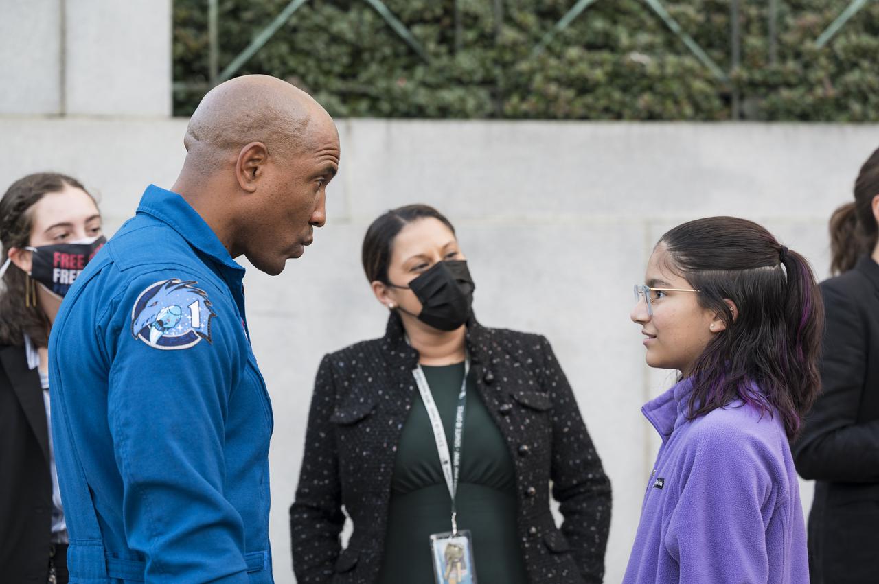 SpaceX Crew-1 NASA astronaut Victor Glover speaks with visitors at the Destination Station mobile exhibition on Capitol Hill, Wednesday, Nov. 17, 2021, in Washington. Glover, and NASA astronauts Mike Hopkins, and Shannon Walker, and Japan Aerospace Exploration Agency (JAXA) astronaut Soichi Noguchi launched on the first crew rotation mission to the International Space Station for SpaceX’s Falcon 9 and Crew Dragon spacecraft as part of the agency’s Commercial Crew Program and spent 168 days in space across Expeditions 64 and 65. Photo Credit: (NASA/Aubrey Gemignani)