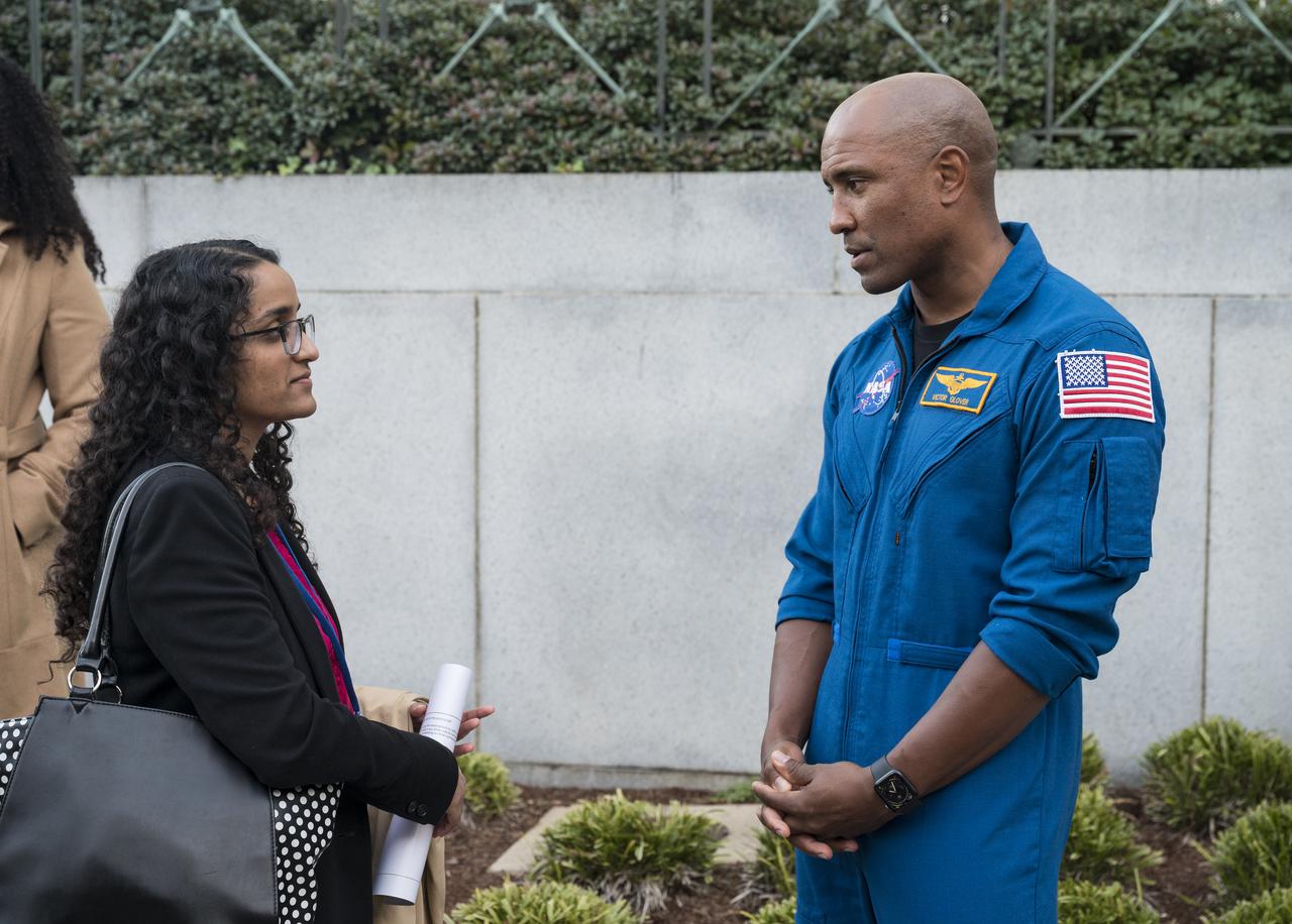 SpaceX Crew-1 NASA astronaut Victor Glover speaks with visitors at the Destination Station mobile exhibition on Capitol Hill, Wednesday, Nov. 17, 2021, in Washington. Glover, and NASA astronauts Mike Hopkins, and Shannon Walker, and Japan Aerospace Exploration Agency (JAXA) astronaut Soichi Noguchi launched on the first crew rotation mission to the International Space Station for SpaceX’s Falcon 9 and Crew Dragon spacecraft as part of the agency’s Commercial Crew Program and spent 168 days in space across Expeditions 64 and 65. Photo Credit: (NASA/Aubrey Gemignani)