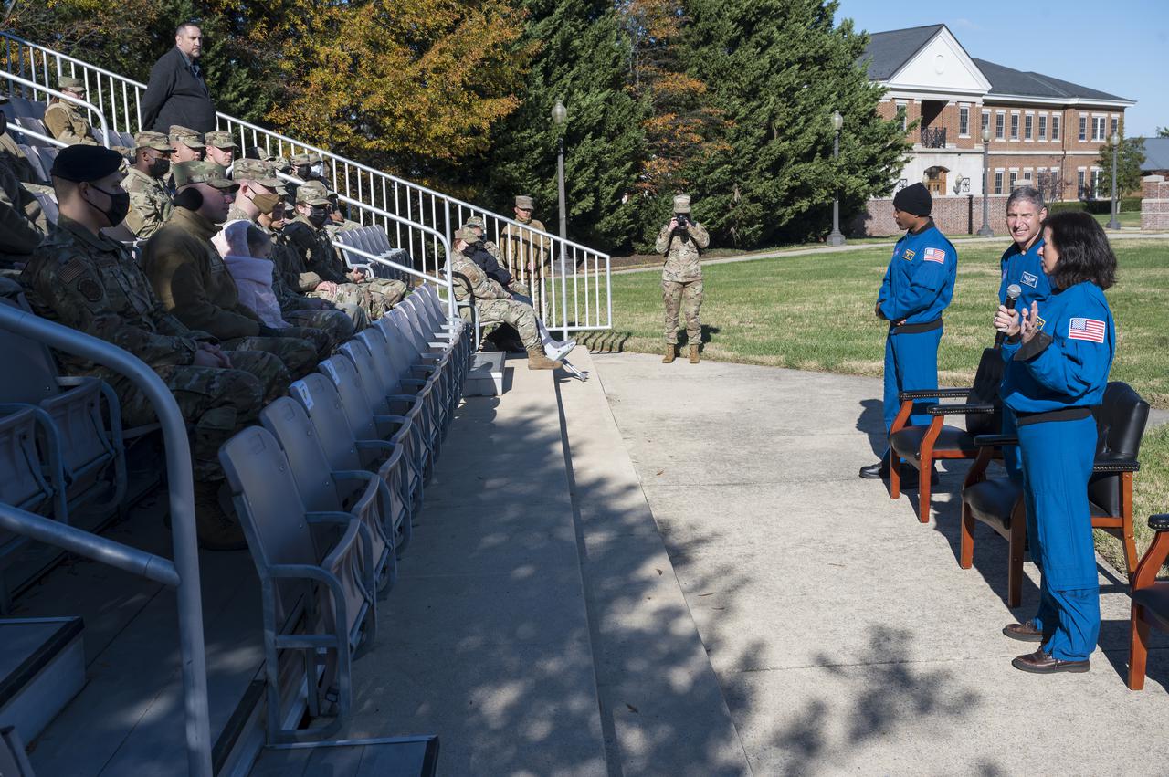 SpaceX Crew-1 NASA astronauts from left, Victor Glover, Mike Hopkins, and Shannon Walker, answer questions from Junior Officers at Joint Base Anacostia-Bolling (JBAB), Friday, Nov. 19, 2021, in Washington. Hopkins, Glover, Walker, and Japan Aerospace Exploration Agency (JAXA) astronaut Soichi Noguchi, launched on the first crew rotation mission to the International Space Station for SpaceX’s Falcon 9 and Crew Dragon spacecraft as part of the agency’s Commercial Crew Program and spent 168 days in space across Expeditions 64 and 65. Photo Credit: (NASA/Aubrey Gemignani)