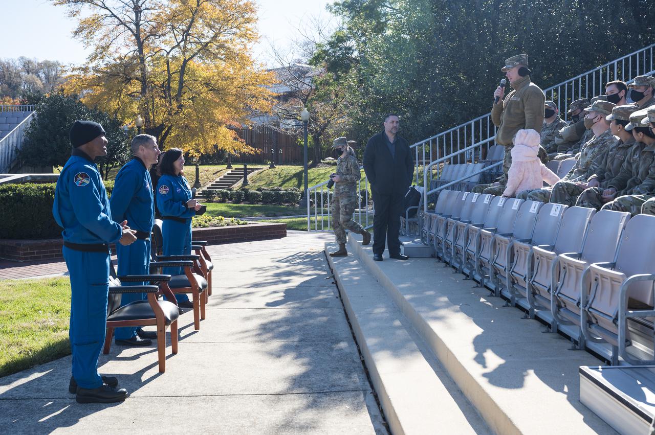 SpaceX Crew-1 NASA astronauts from left, Victor Glover, Mike Hopkins, and Shannon Walker, answer questions from Junior Officers at Joint Base Anacostia-Bolling (JBAB), Friday, Nov. 19, 2021, in Washington. Hopkins, Glover, Walker, and Japan Aerospace Exploration Agency (JAXA) astronaut Soichi Noguchi, launched on the first crew rotation mission to the International Space Station for SpaceX’s Falcon 9 and Crew Dragon spacecraft as part of the agency’s Commercial Crew Program and spent 168 days in space across Expeditions 64 and 65. Photo Credit: (NASA/Aubrey Gemignani)