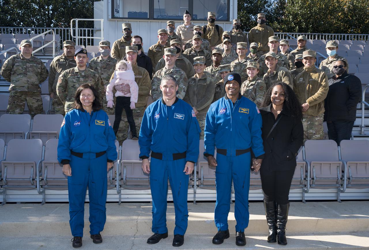 SpaceX Crew-1 NASA astronauts Mike Hopkins, Shannon Walker, and Victor Glover  visit Joint Base Anacostia-Bolling (JBAB), Friday, Nov. 19, 2021, in Washington. Hopkins, Glover, Walker, and Japan Aerospace Exploration Agency (JAXA) astronaut Soichi Noguchi, launched on the first crew rotation mission to the International Space Station for SpaceX’s Falcon 9 and Crew Dragon spacecraft as part of the agency’s Commercial Crew Program and spent 168 days in space across Expeditions 64 and 65. Photo Credit: (NASA/Aubrey Gemignani)