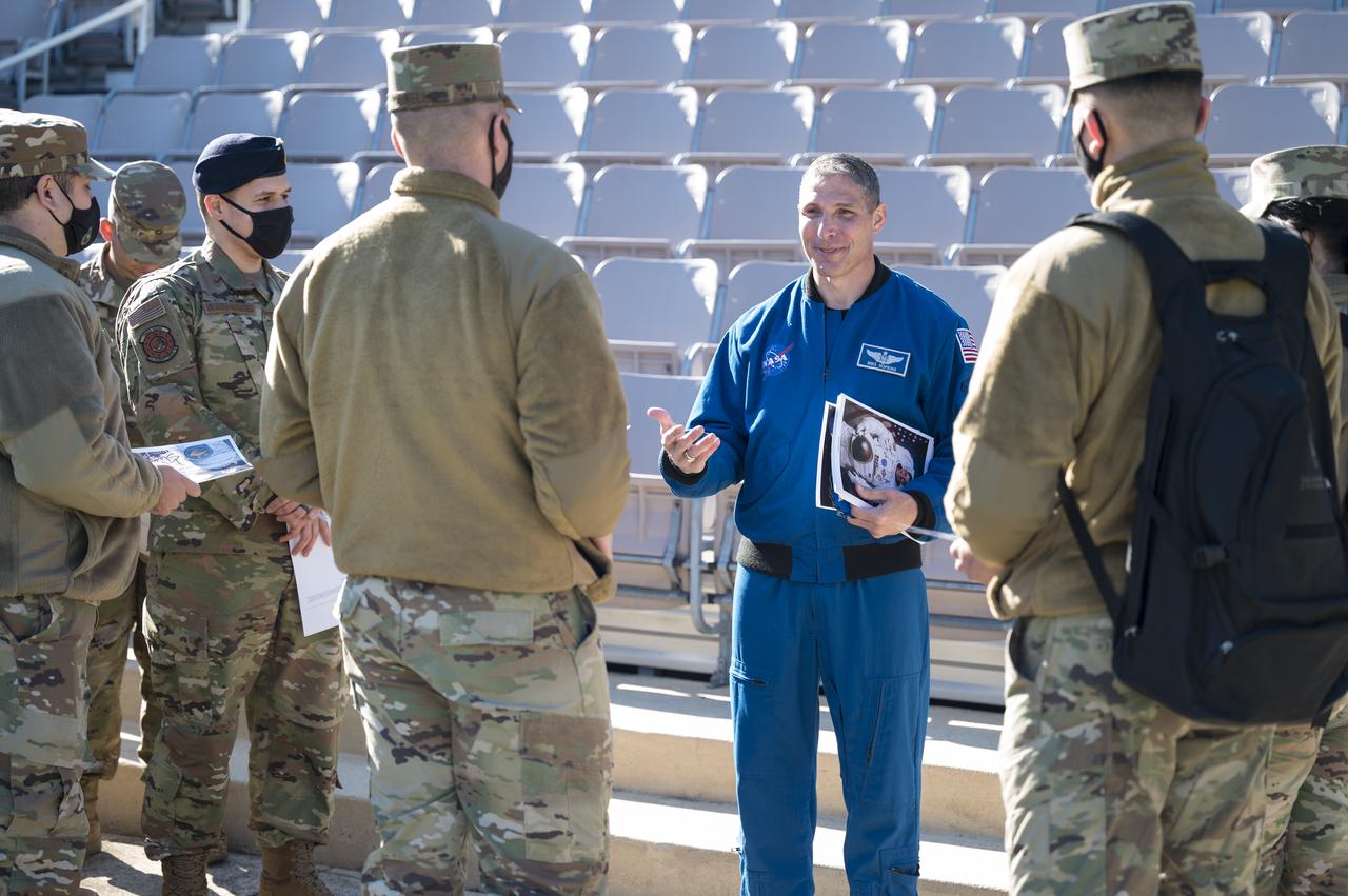 SpaceX Crew-1 NASA astronaut Mike Hopkins speaks with Junior Officers at Joint Base Anacostia-Bolling (JBAB), Friday, Nov. 19, 2021, in Washington. Hopkins, and crew mates NASA astronauts Victor Glover, Shannon Walker, and Japan Aerospace Exploration Agency (JAXA) astronaut Soichi Noguchi, launched on the first crew rotation mission to the International Space Station for SpaceX’s Falcon 9 and Crew Dragon spacecraft as part of the agency’s Commercial Crew Program and spent 168 days in space across Expeditions 64 and 65. Photo Credit: (NASA/Aubrey Gemignani)
