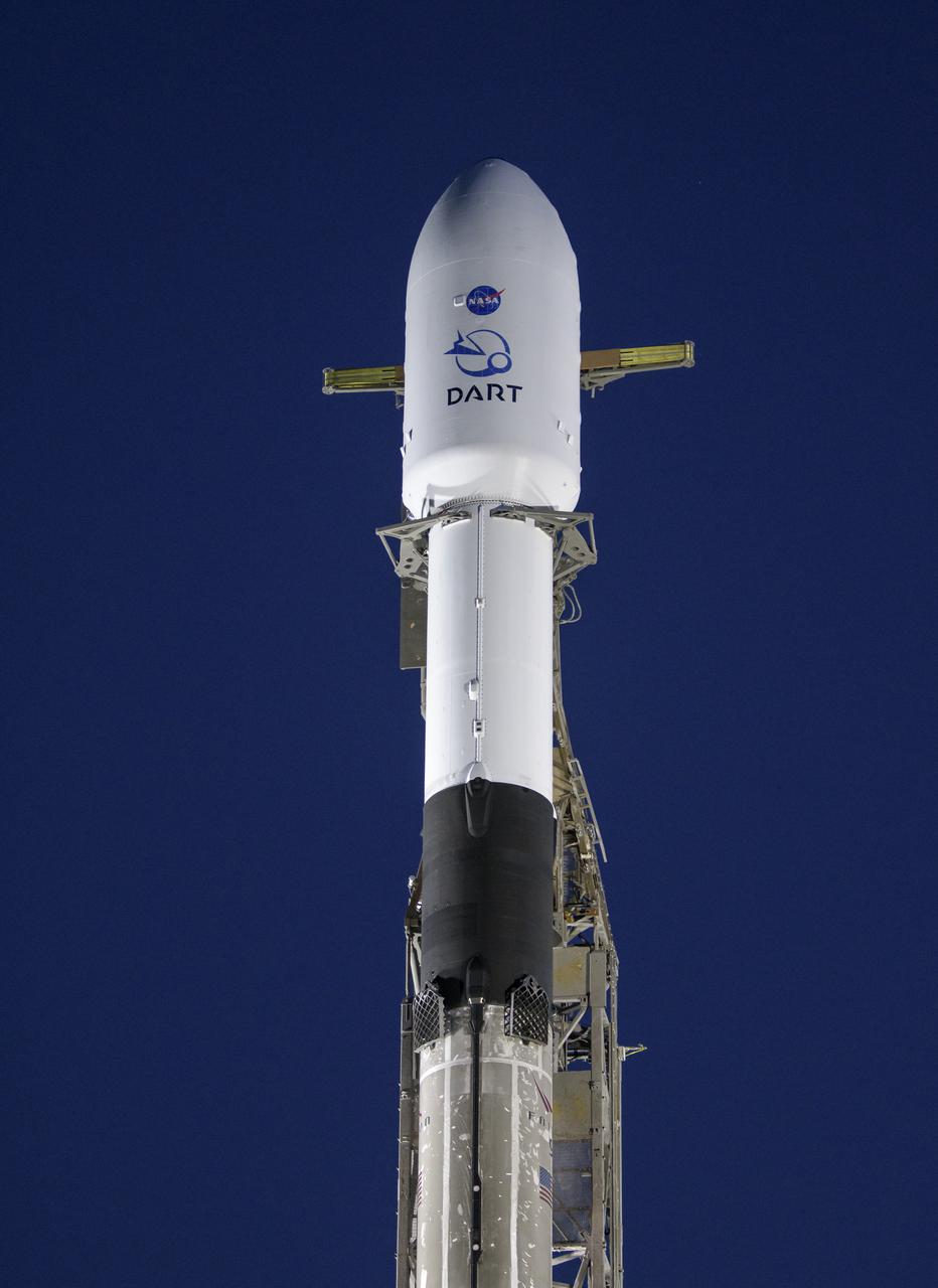 The SpaceX Falcon 9 rocket with the Double Asteroid Redirection Test, or DART, spacecraft onboard, is seen during sunrise, Tuesday, Nov. 23, 2021, at Space Launch Complex 4E, Vandenberg Space Force Base in California. DART is the world’s first full-scale planetary defense test, demonstrating one method of asteroid deflection technology. The mission was built and is managed by the Johns Hopkins APL for NASA’s Planetary Defense Coordination Office. Photo Credit: (NASA/Bill Ingalls)
