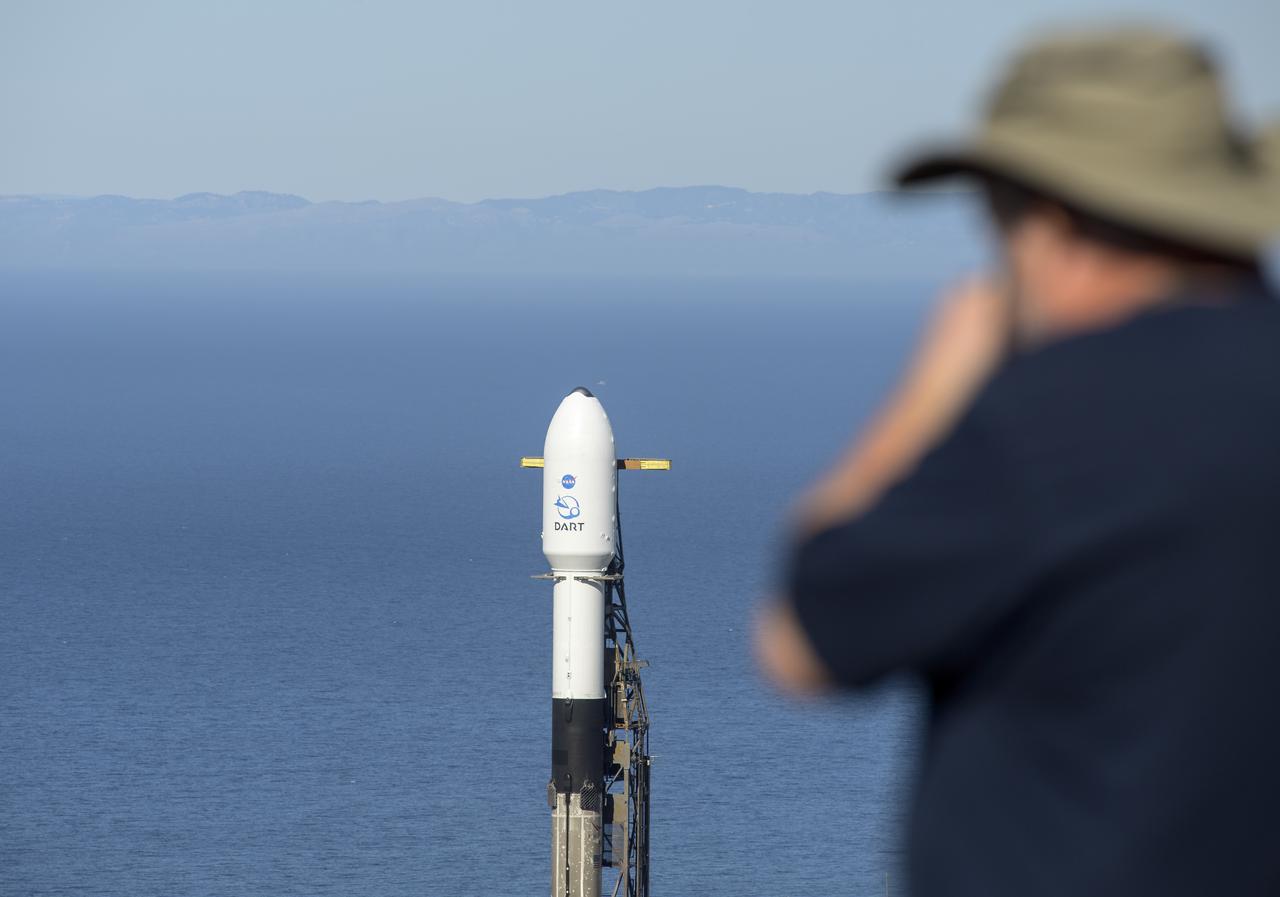 The SpaceX Falcon 9 rocket with the Double Asteroid Redirection Test, or DART, spacecraft onboard, is seen, Tuesday, Nov. 23, 2021, at Space Launch Complex 4E, Vandenberg Space Force Base in California. DART is the world’s first full-scale planetary defense test, demonstrating one method of asteroid deflection technology. The mission was built and is managed by Johns Hopkins APL for NASA’s Planetary Defense Coordination Office. Photo Credit: (NASA/Bill Ingalls)