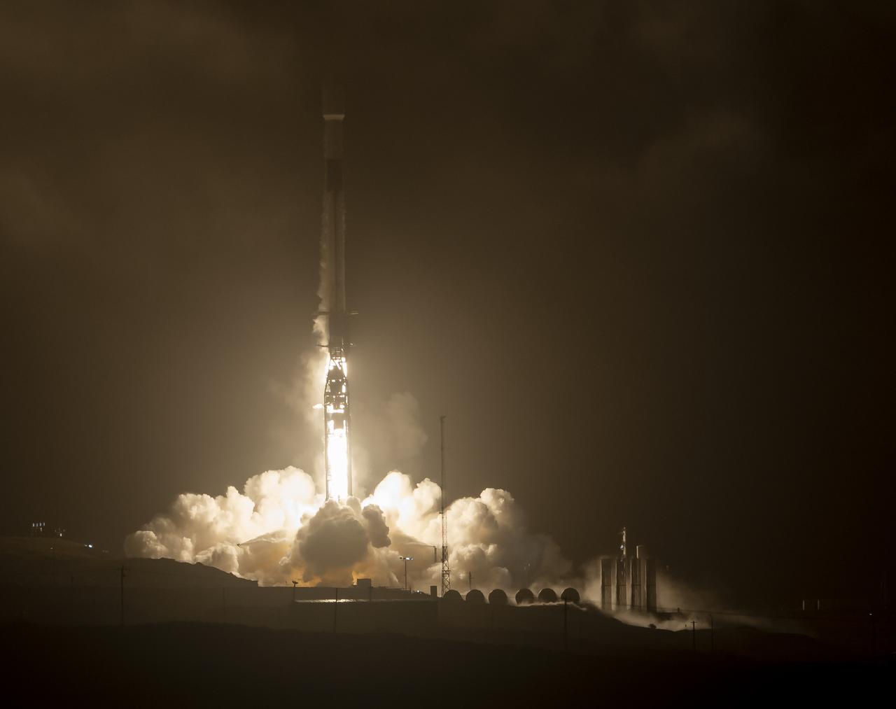 The SpaceX Falcon 9 rocket launches with the Double Asteroid Redirection Test, or DART, spacecraft onboard, Tuesday, Nov. 23, 2021, Pacific time (Nov. 24 Eastern time) from Space Launch Complex 4E at Vandenberg Space Force Base in California. DART is the world’s first full-scale planetary defense test, demonstrating one method of asteroid deflection technology. The mission was built and is managed by Johns Hopkins APL for NASA’s Planetary Defense Coordination Office. Photo Credit: (NASA/Bill Ingalls)