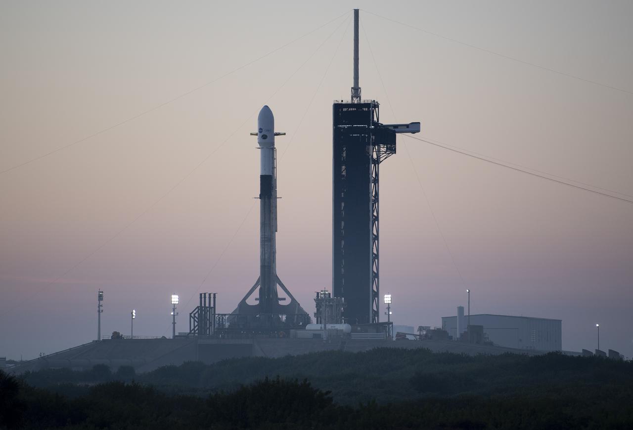 A SpaceX Falcon 9 rocket carrying NASA’s Imaging X-ray Polarimetry Explorer (IXPE) spacecraft is seen on the launch pad at Launch Complex 39A, Wednesday, Dec. 8, 2021, at NASA’s Kennedy Space Center in Florida. The IXPE spacecraft is the first satellite dedicated to measuring the polarization of X-rays from a variety of cosmic sources, such as black holes and neutron stars. Photo Credit: (NASA/Joel Kowsky)