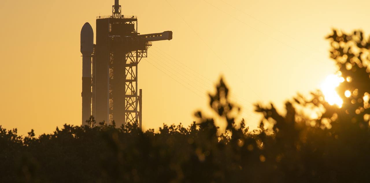 A SpaceX Falcon 9 rocket carrying NASA’s Imaging X-ray Polarimetry Explorer (IXPE) spacecraft is seen on the launch pad at Launch Complex 39A, Wednesday, Dec. 8, 2021, at NASA’s Kennedy Space Center in Florida. The IXPE spacecraft is the first satellite dedicated to measuring the polarization of X-rays from a variety of cosmic sources, such as black holes and neutron stars. Photo Credit: (NASA/Joel Kowsky)