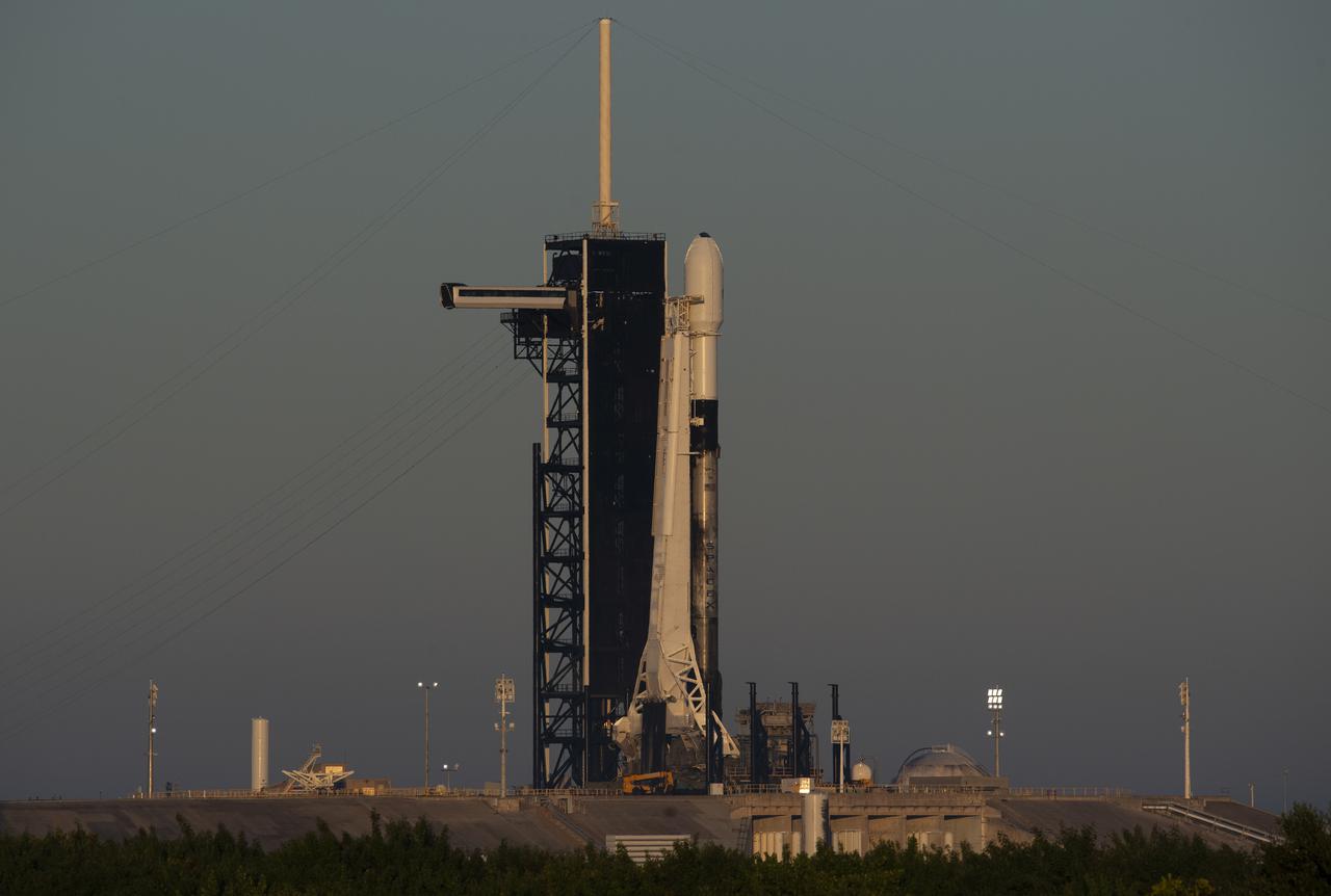 A SpaceX Falcon 9 rocket carrying NASA’s Imaging X-ray Polarimetry Explorer (IXPE) spacecraft is seen on the launch pad at Launch Complex 39A, Wednesday, Dec. 8, 2021, at NASA’s Kennedy Space Center in Florida. The IXPE spacecraft is the first satellite dedicated to measuring the polarization of X-rays from a variety of cosmic sources, such as black holes and neutron stars. Photo Credit: (NASA/Joel Kowsky)