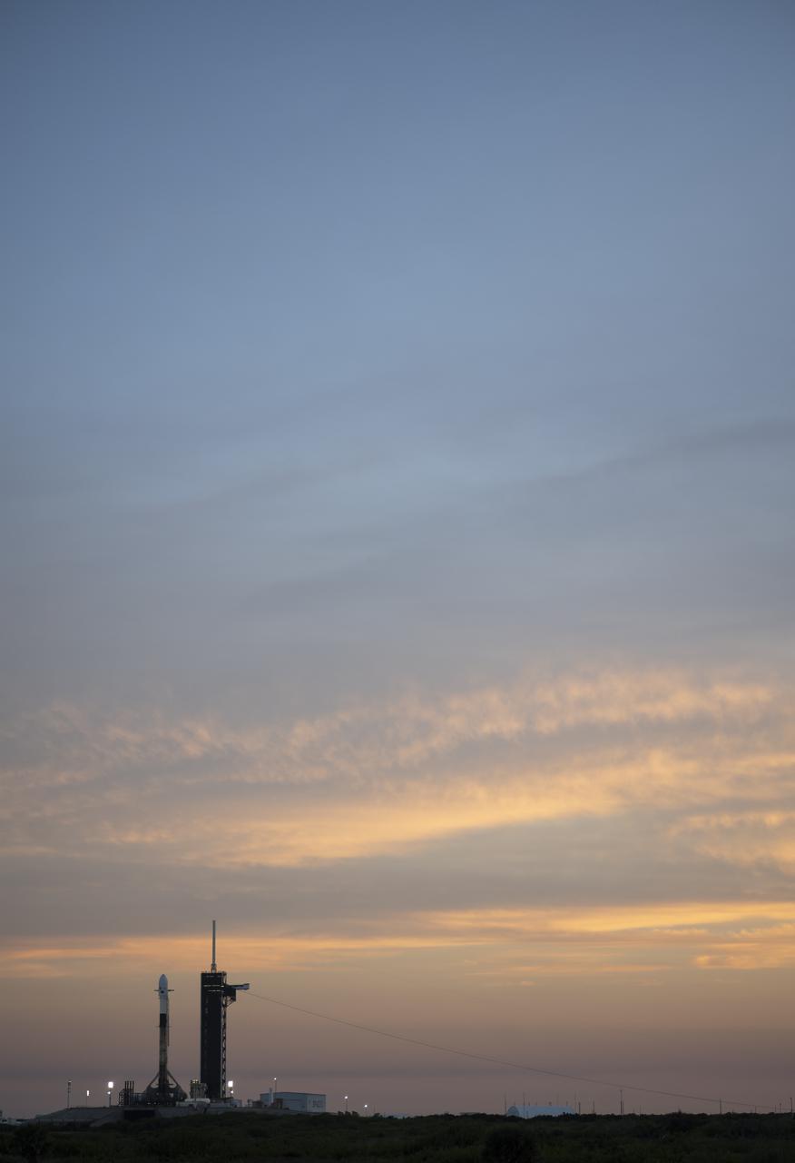 A SpaceX Falcon 9 rocket carrying NASA’s Imaging X-ray Polarimetry Explorer (IXPE) spacecraft is seen on the launch pad at Launch Complex 39A, Wednesday, Dec. 8, 2021, at NASA’s Kennedy Space Center in Florida. The IXPE spacecraft is the first satellite dedicated to measuring the polarization of X-rays from a variety of cosmic sources, such as black holes and neutron stars. Photo Credit: (NASA/Joel Kowsky)